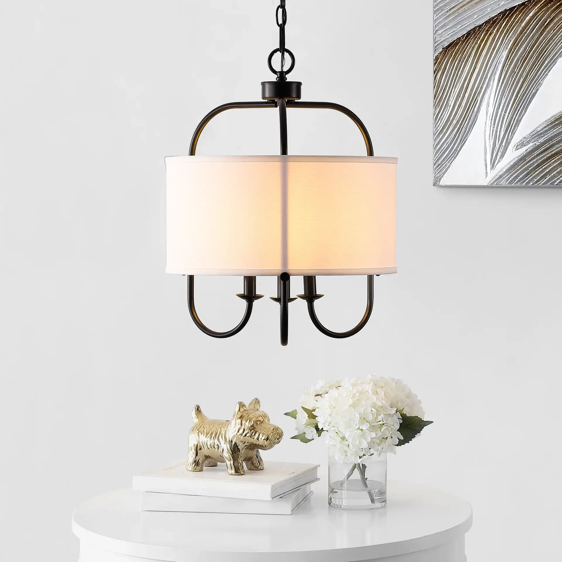 Jemmi Three-Light Pendant in Black in a styled room