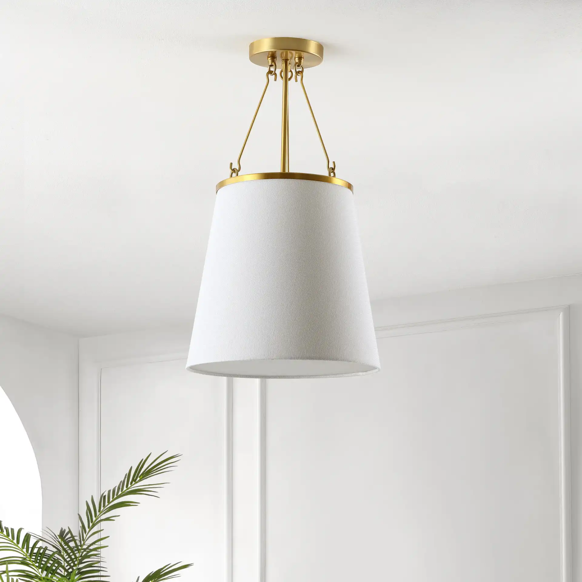 Valor Pendant in Gold / White in a styled room