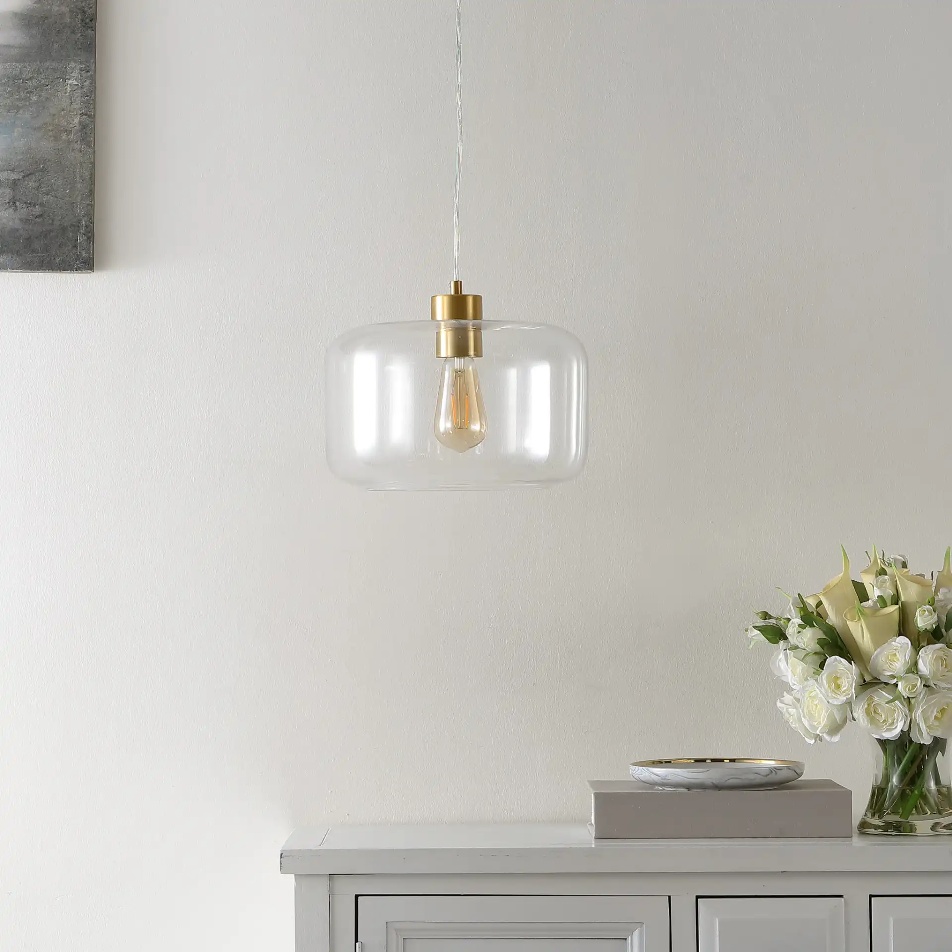 Warden Pendant in Gold / Clear in a styled room