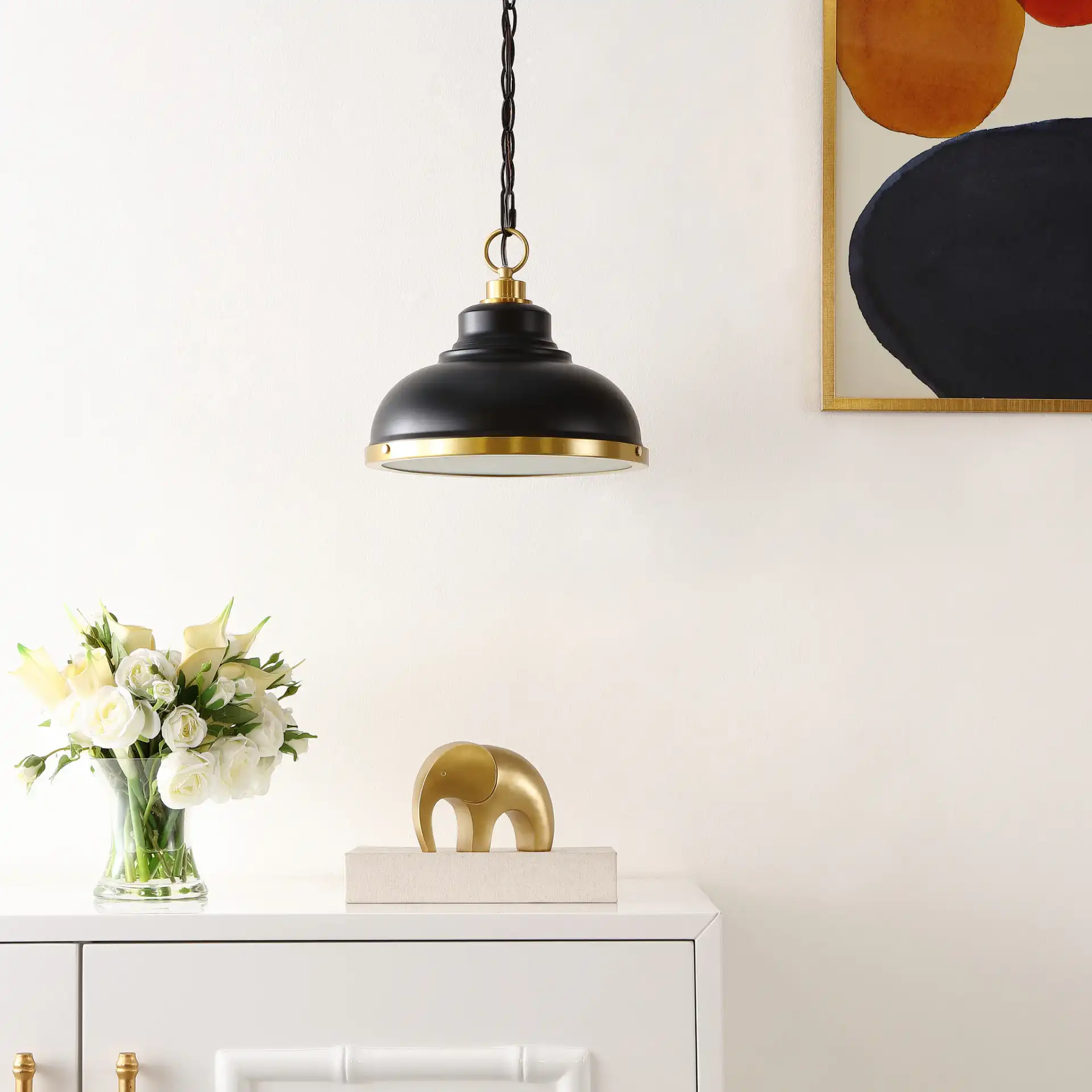 Bastion Pendant in Black / Brass in a styled room