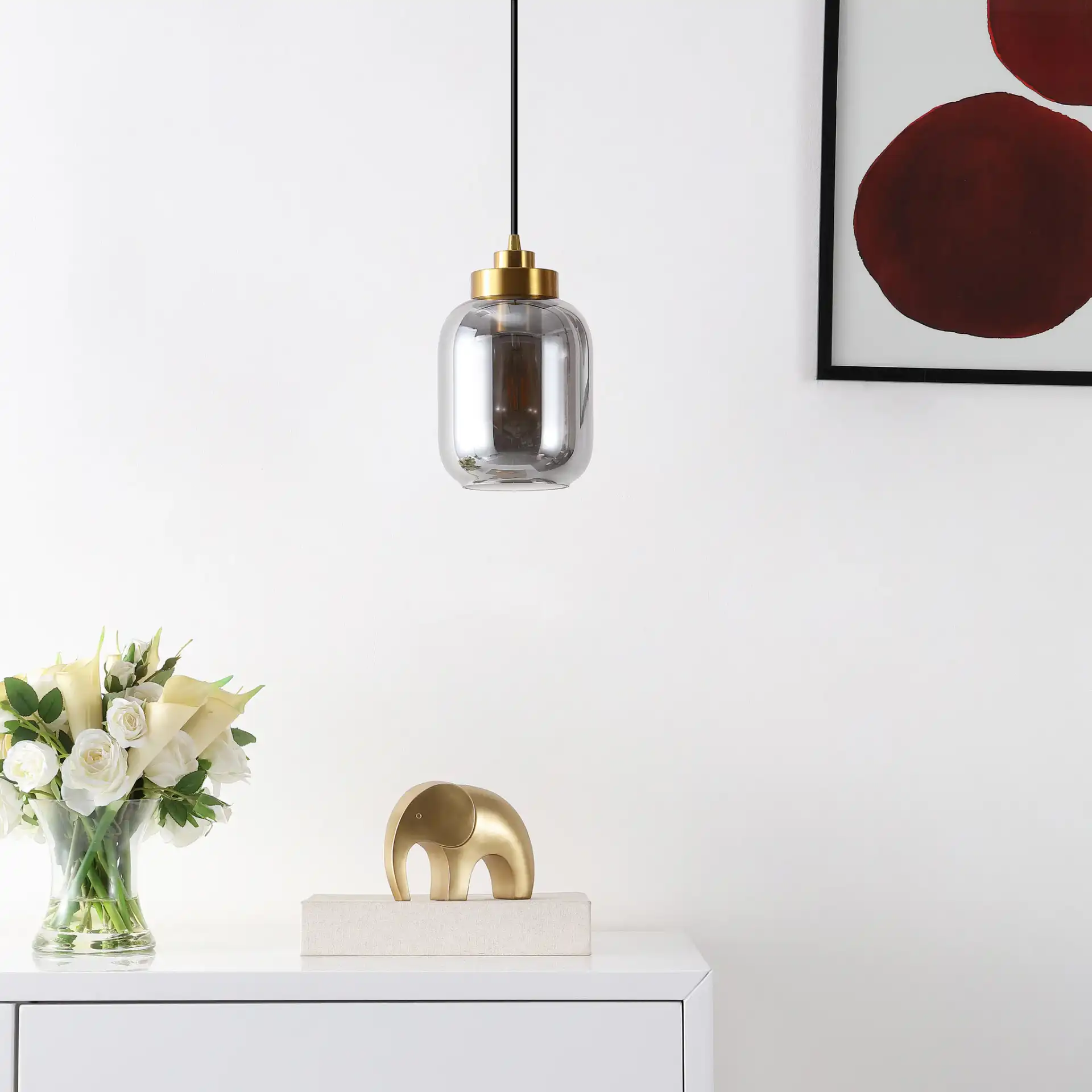 Ethyx Pendant in Smoke Gray / Brass in a styled room