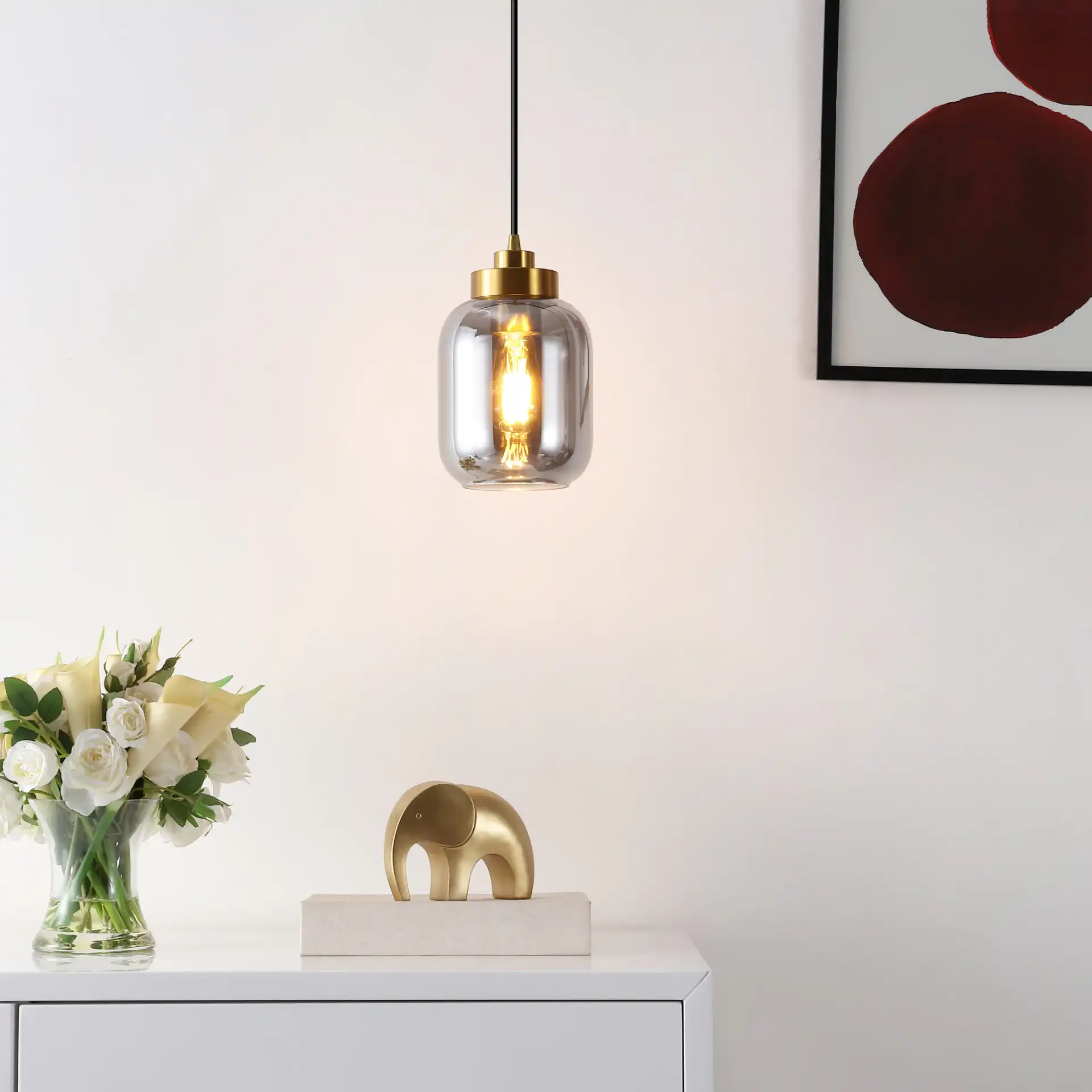 Ethyx Pendant in Smoke Gray / Brass in a styled room