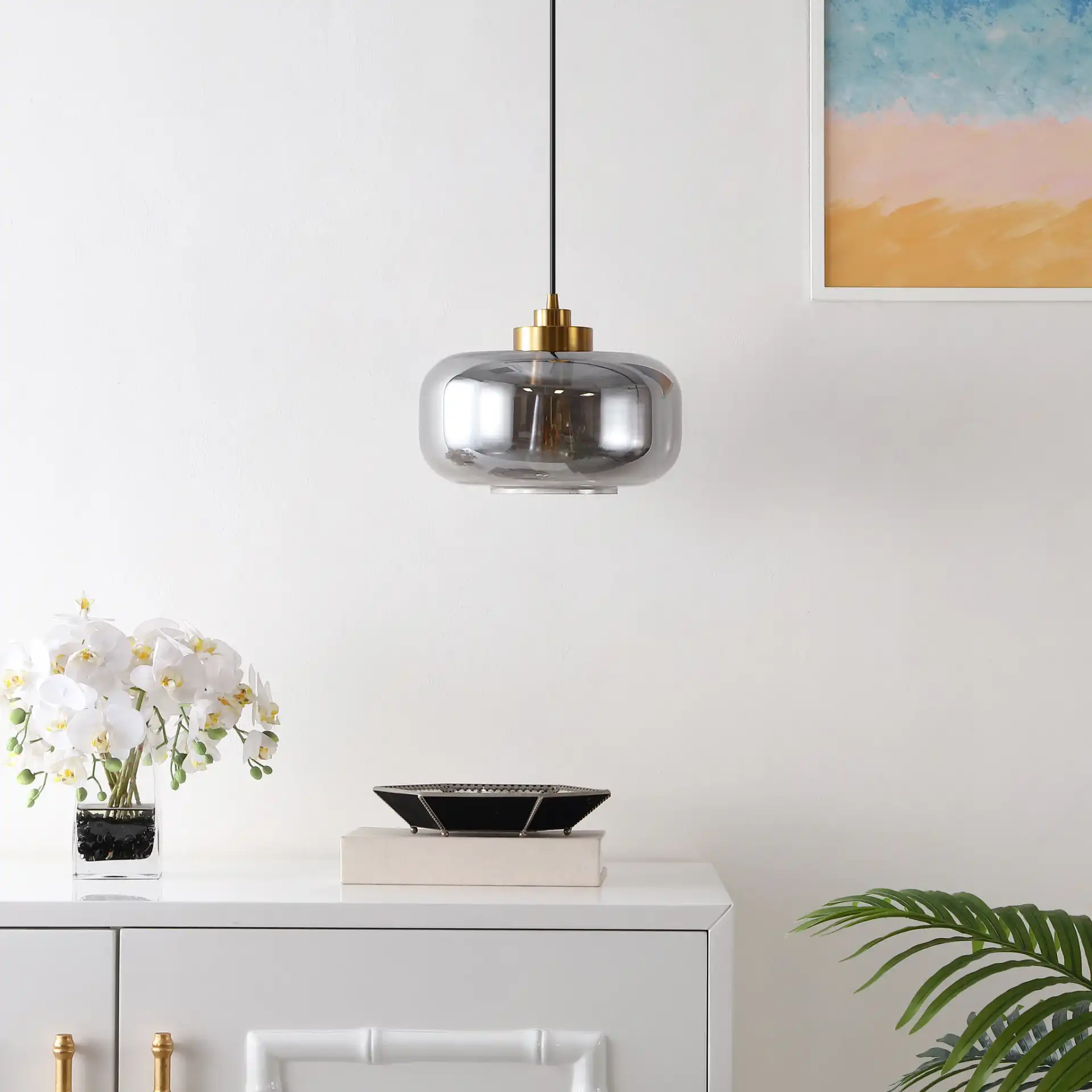 Edge Pendant in Smoke Gray / Brass in a styled room