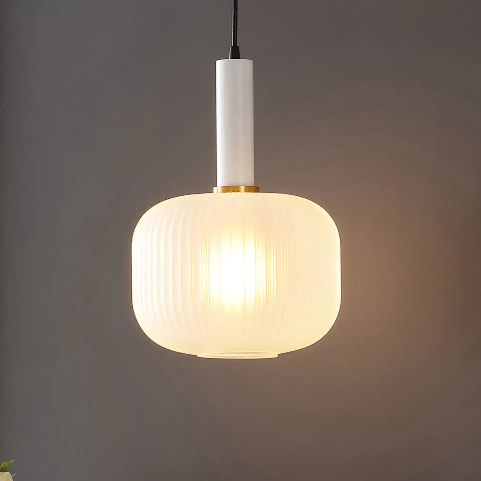 Naois Pendant in White / Black in a styled room