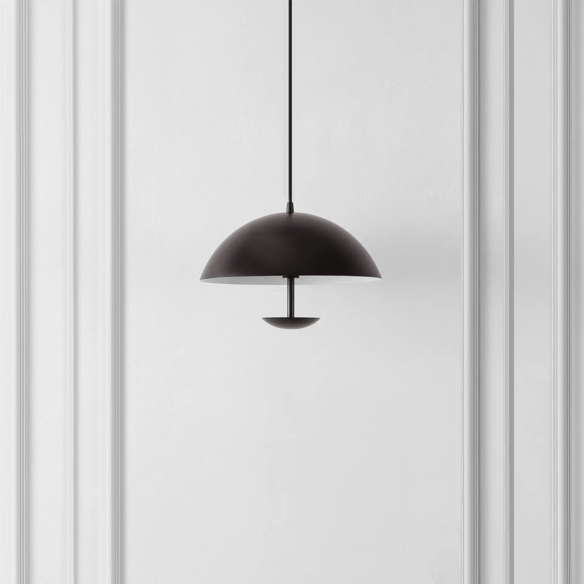 Lybrin Pendant in Black in a styled room