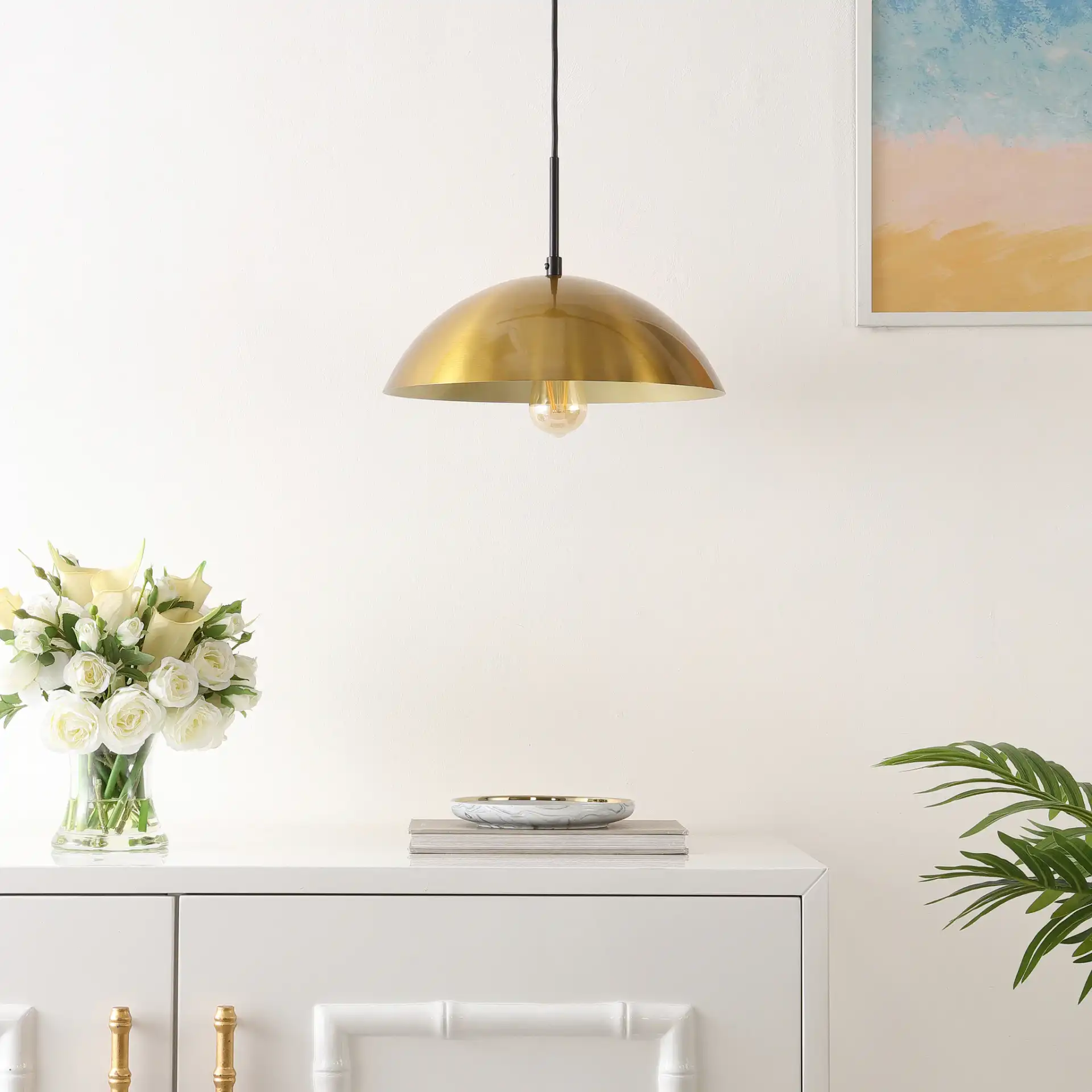 Jorden Pendant in Brass / Black in a styled room
