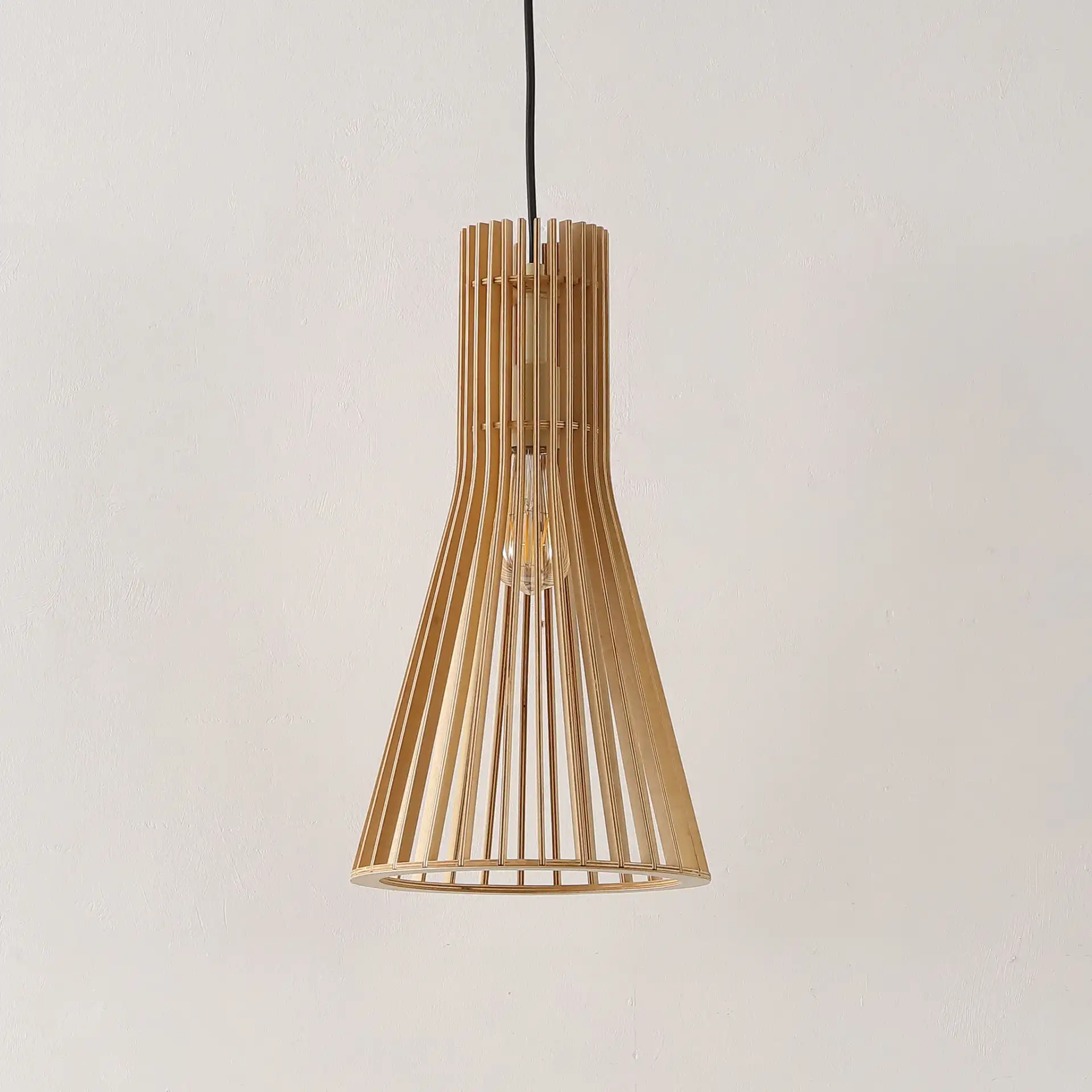 Sonjay Pendant in Natural in a styled room