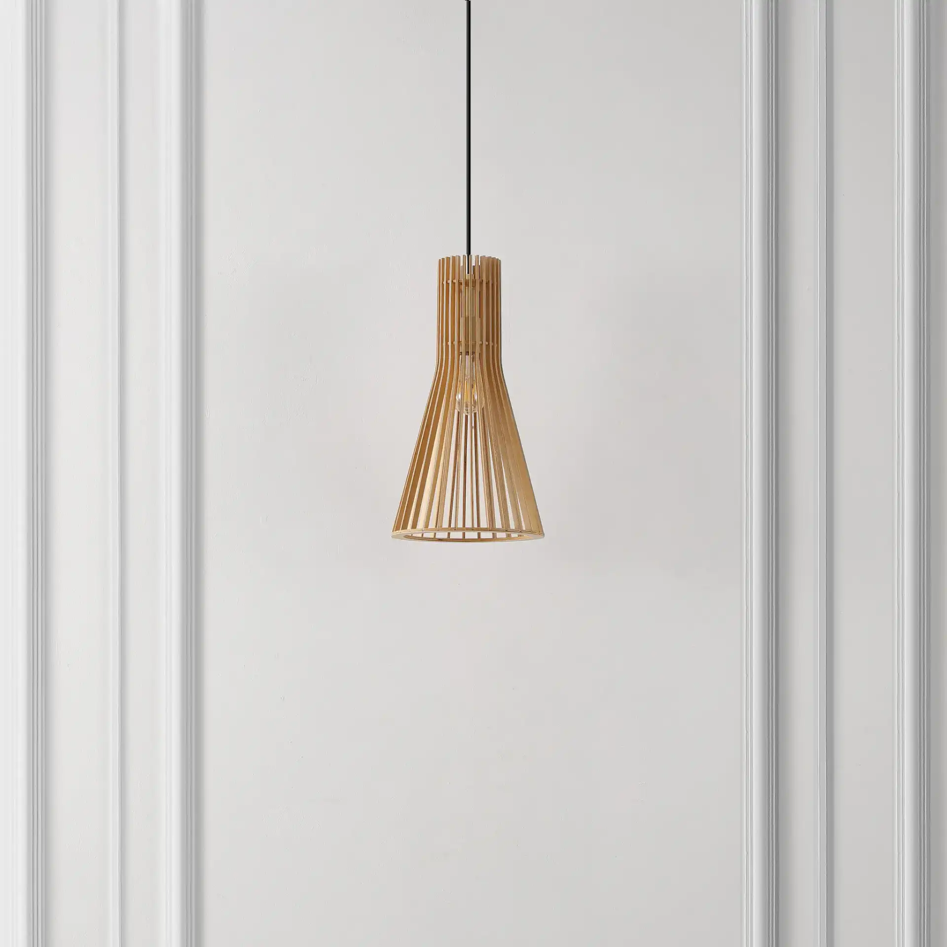 Sonjay Pendant in Natural in a styled room
