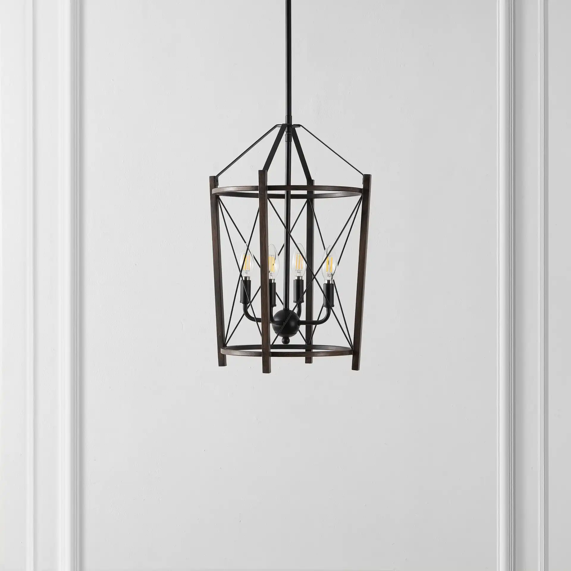 Peltier Four-Light Pendant in Dark Walnut / Black in a styled room