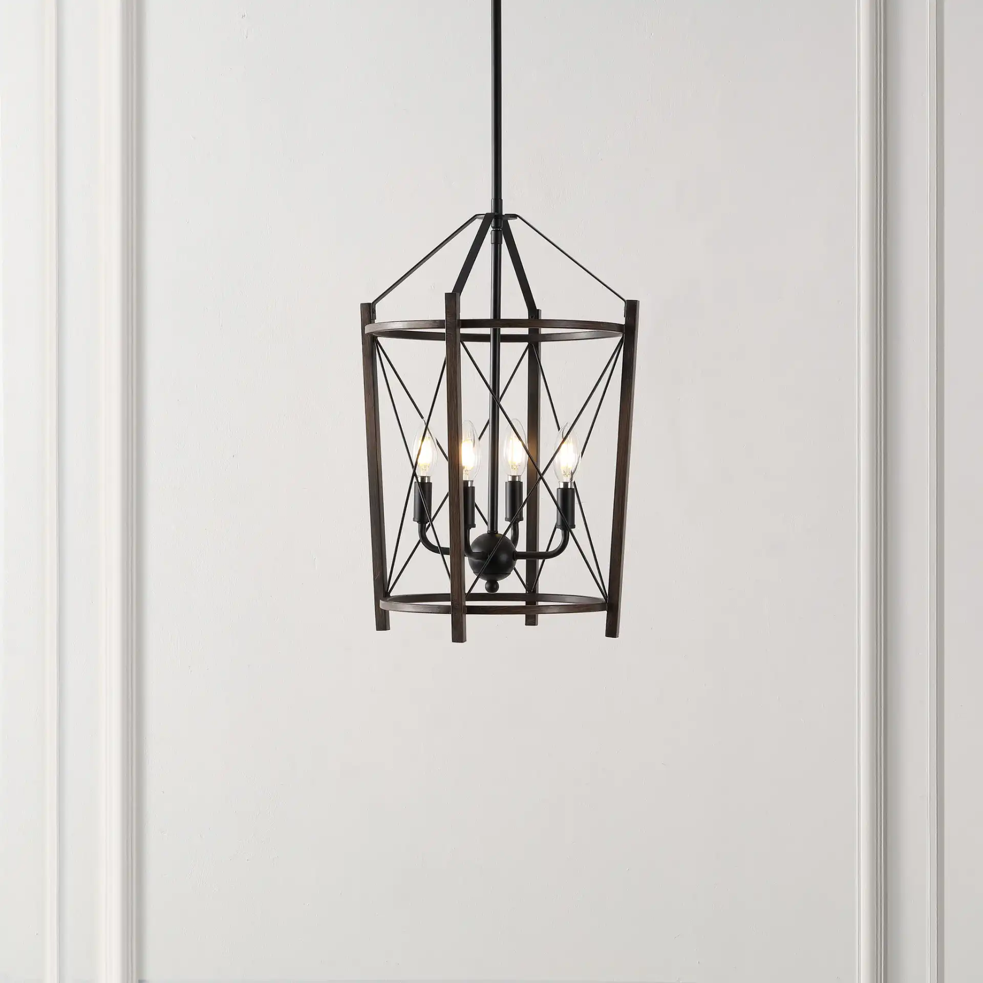 Peltier Four-Light Pendant in Dark Walnut / Black in a styled room
