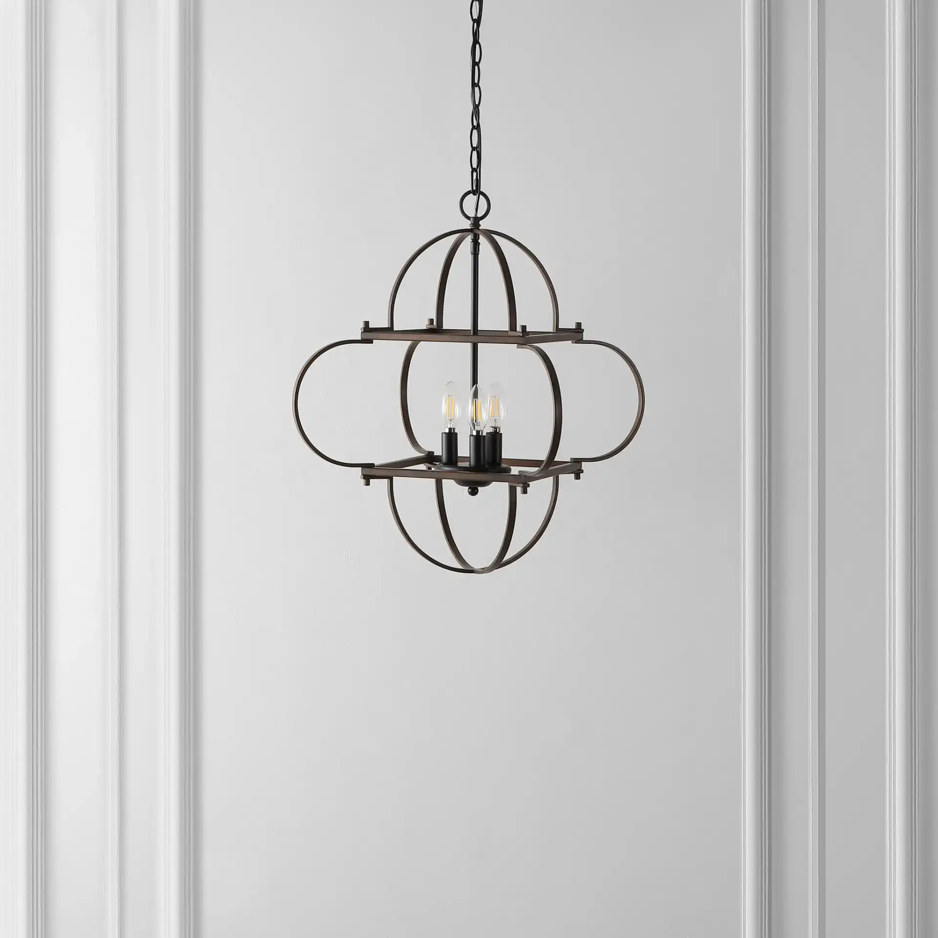 Galvin Three-Light Pendant in Black / Walnut in a styled room