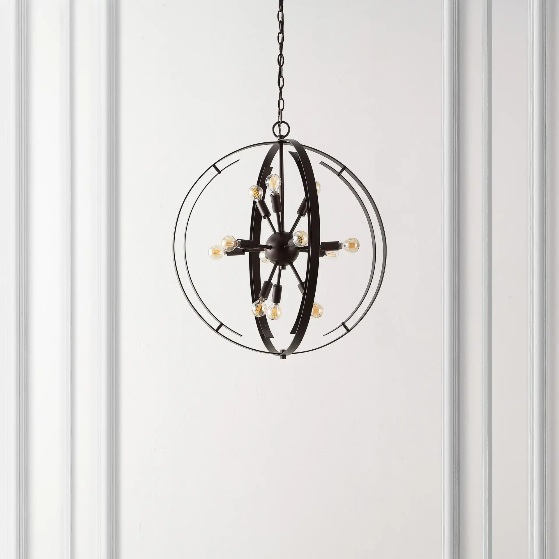 Syosset Twelve-Light Pendant in Oil Rub Bronze in a styled room