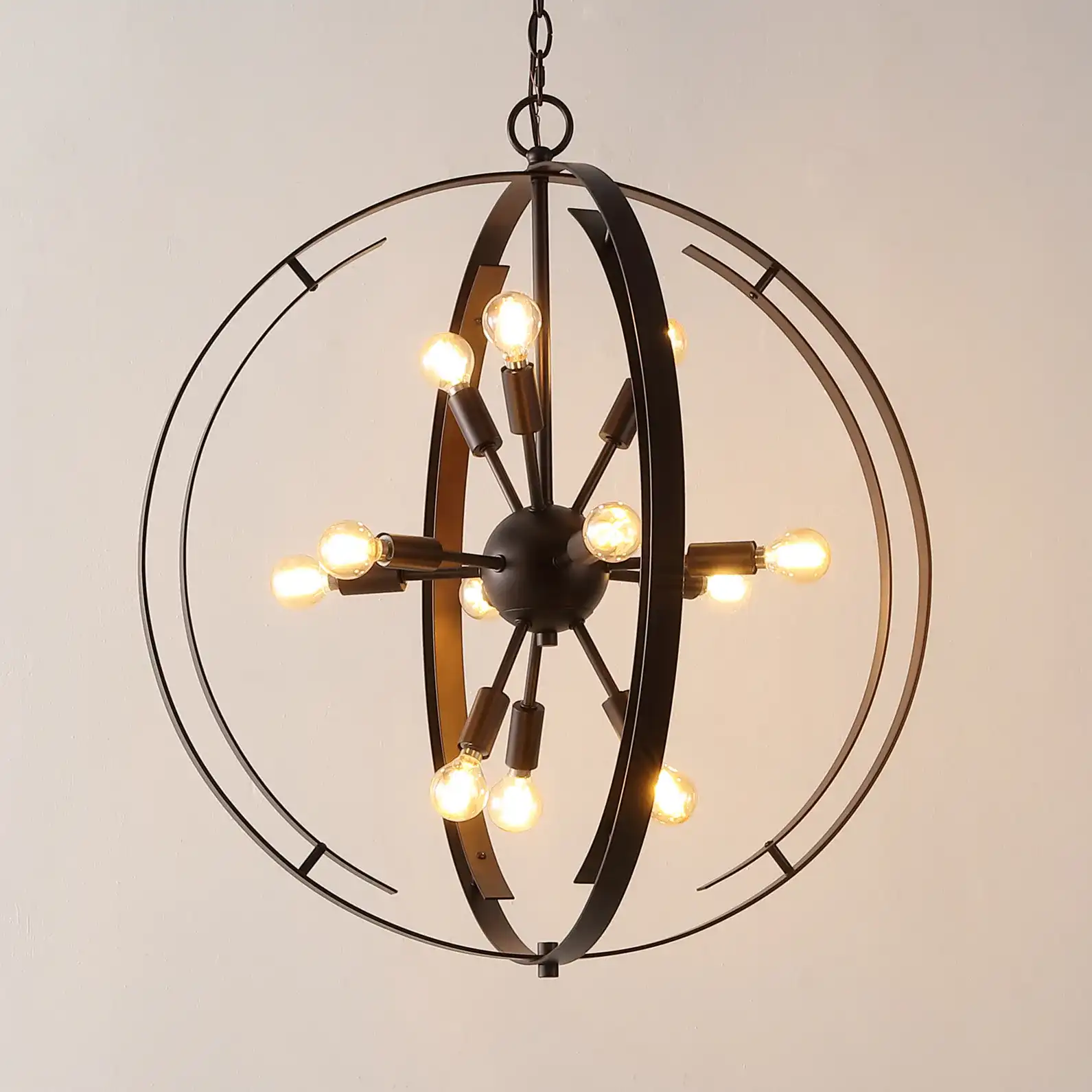 Syosset Twelve-Light Pendant in Oil Rub Bronze in a styled room