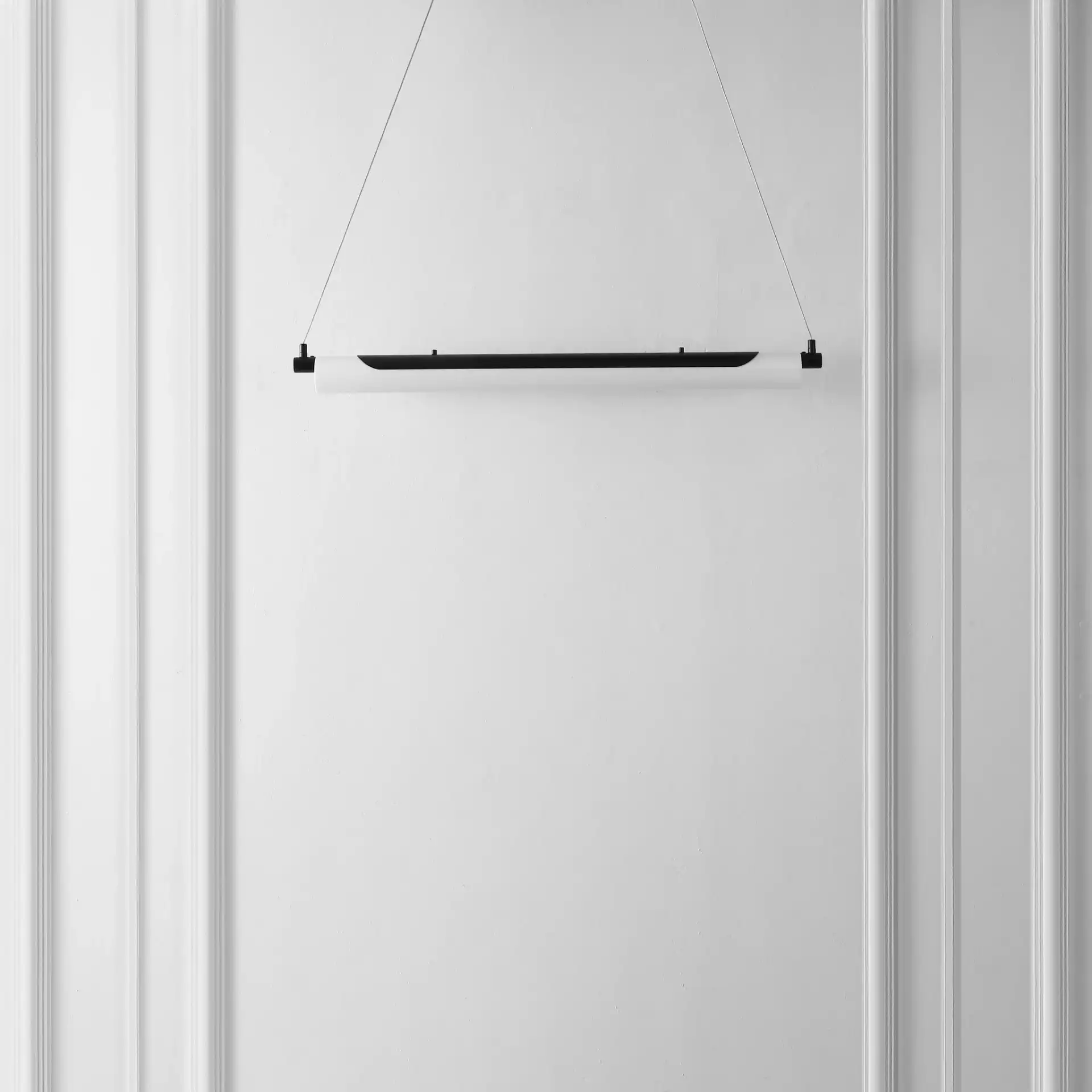 Tyto Led Pendant in Black in a styled room