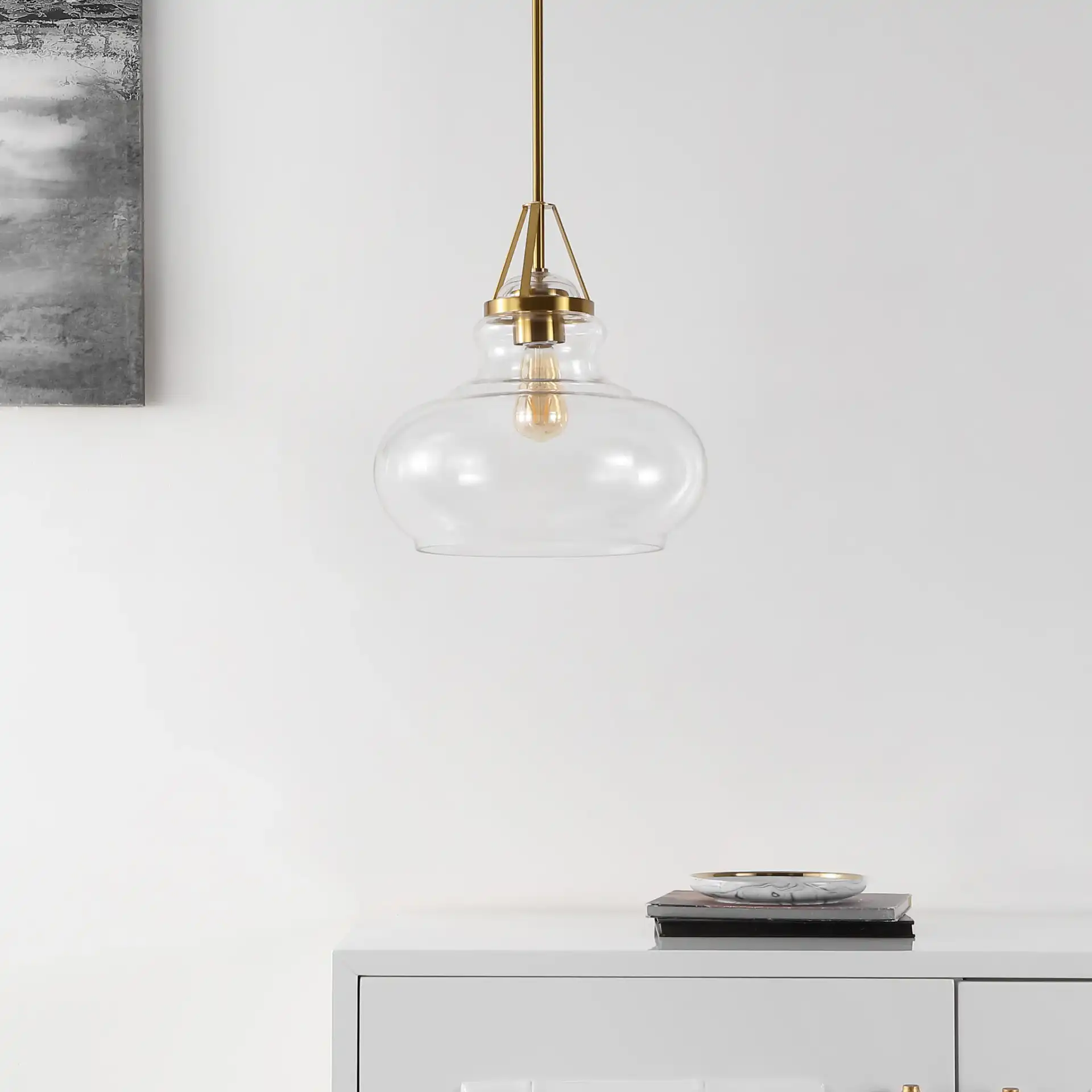 Salud Pendant in Brass / Clear in a styled room