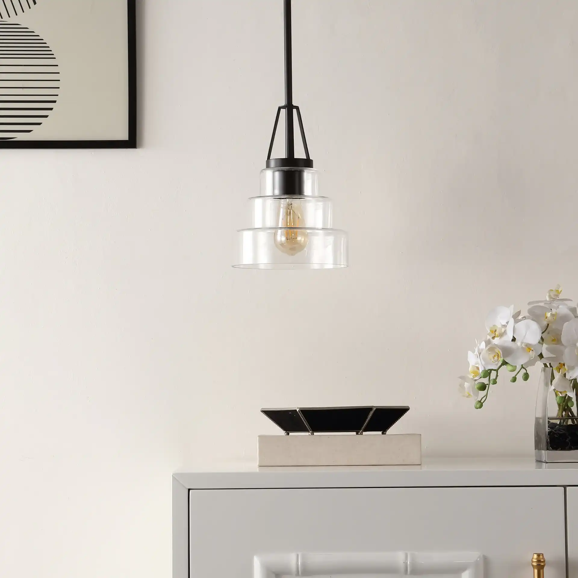 Raylen Pendant in Clear / Oil Rub Bronze in a styled room