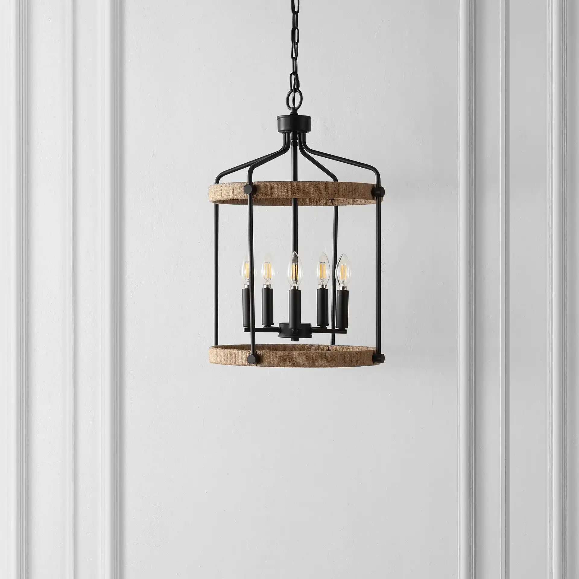 Dwyer Five-Light Pendant in Black / Brown in a styled room