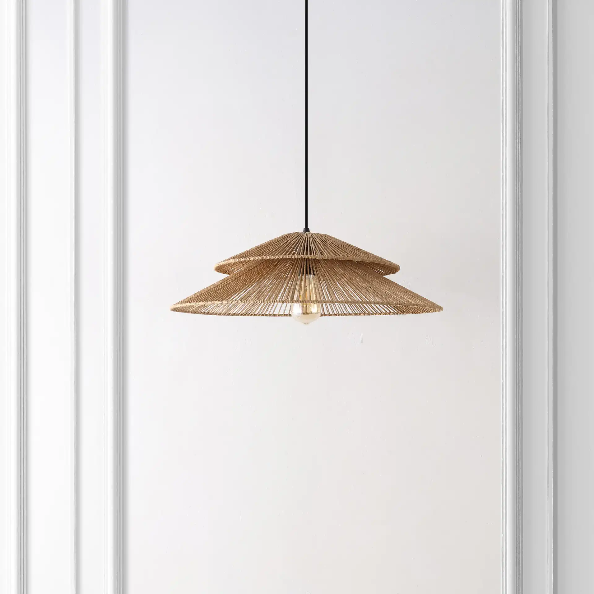 Brunia Pendant in Natural / Black in a styled room