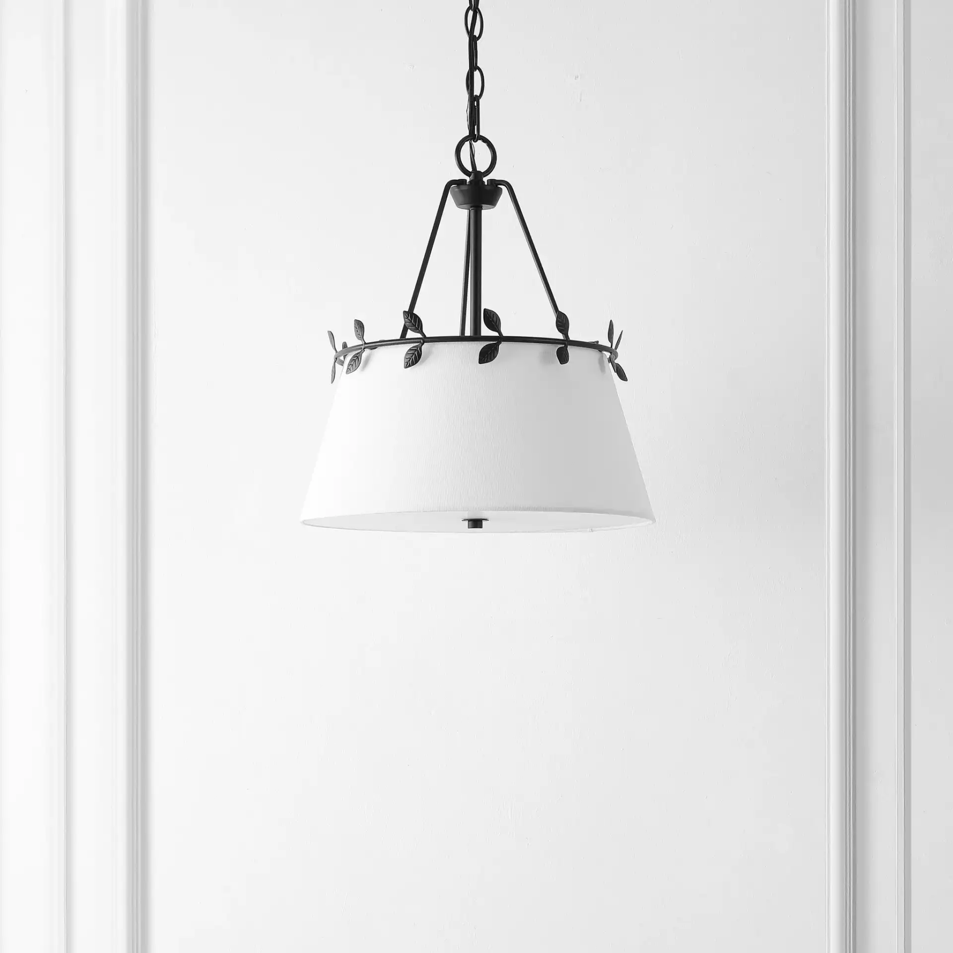 Samora Three-Light Pendant in White / Black in a styled room