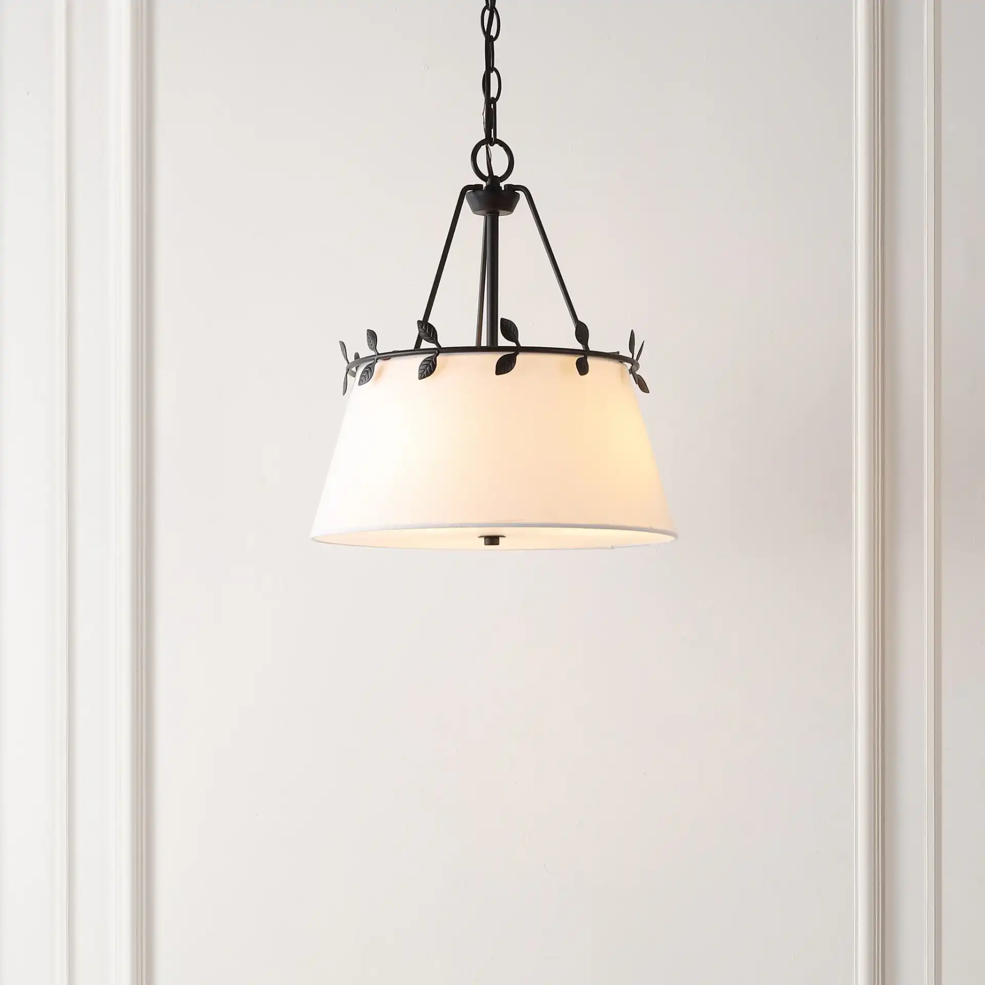 Samora Three-Light Pendant in White / Black in a styled room