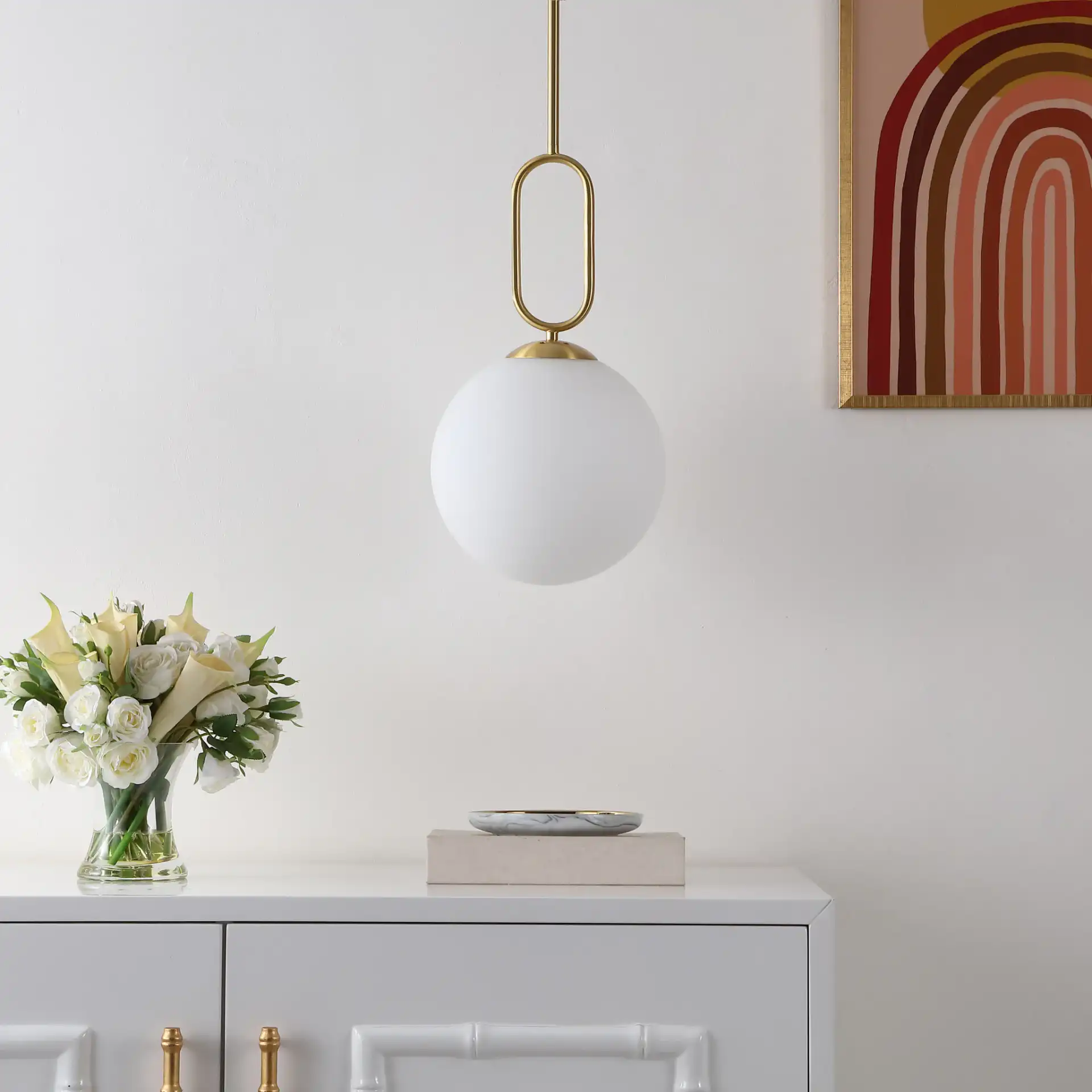 Danva Pendant in Brass in a styled room