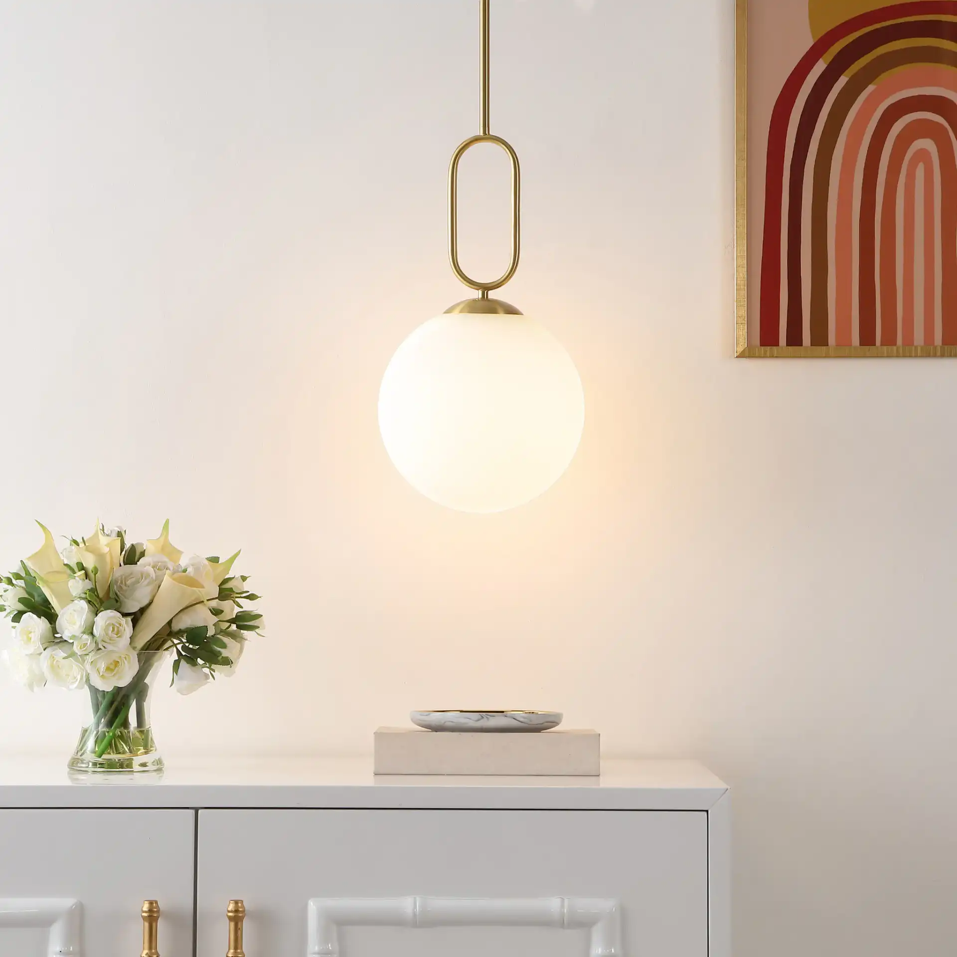 Danva Pendant in Brass in a styled room