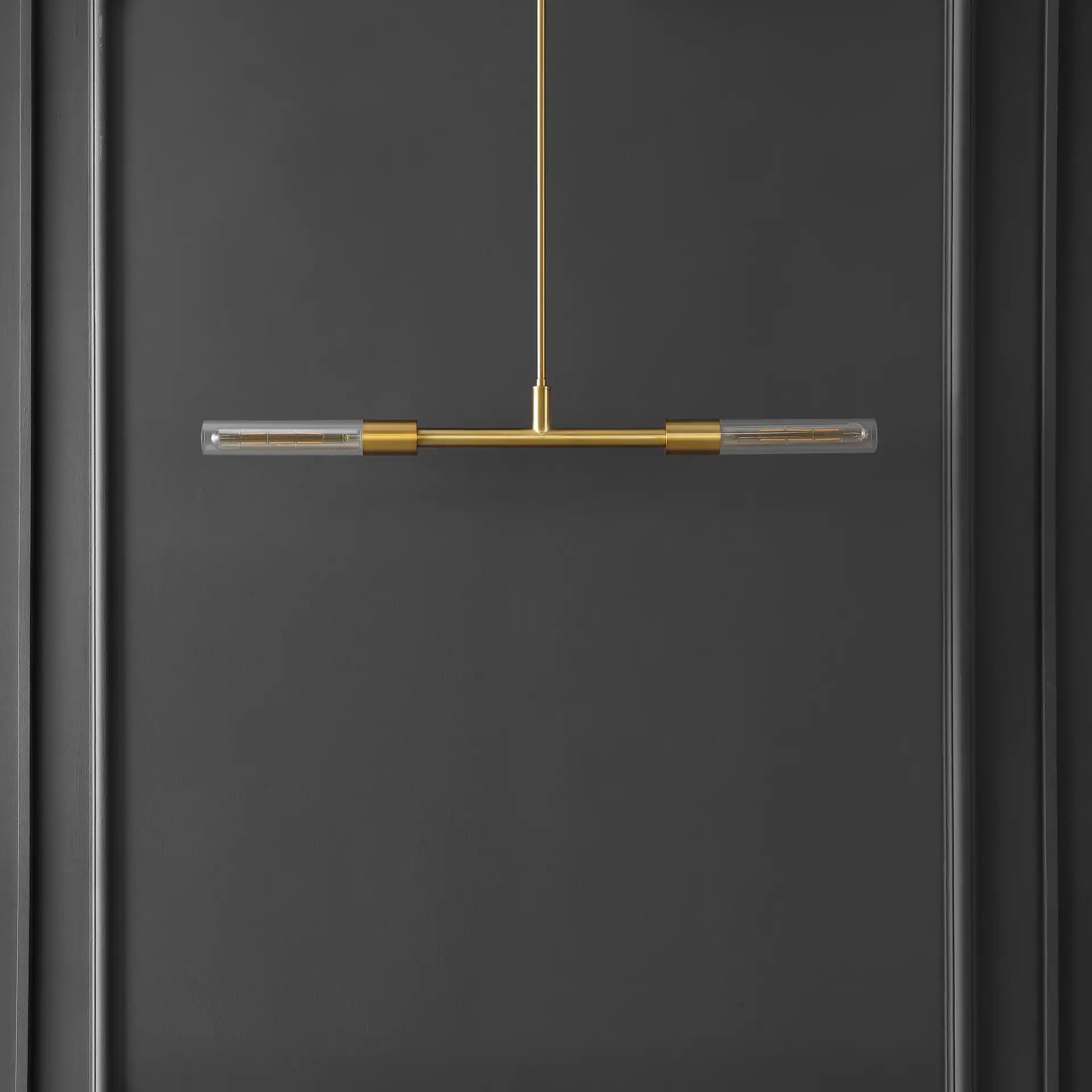 Vasei Two-Light Pendant in Brass / Clear in a styled room