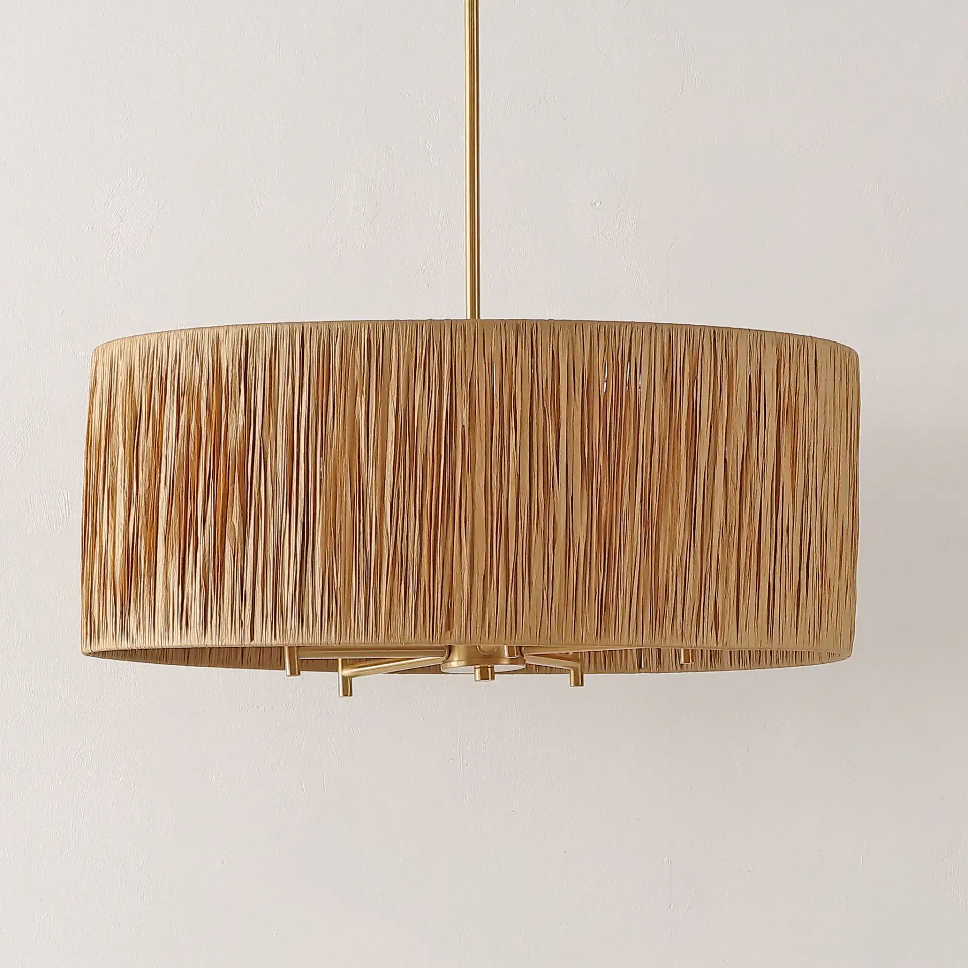 Colessa Five-Light Pendant in Natural / Gold in a styled room