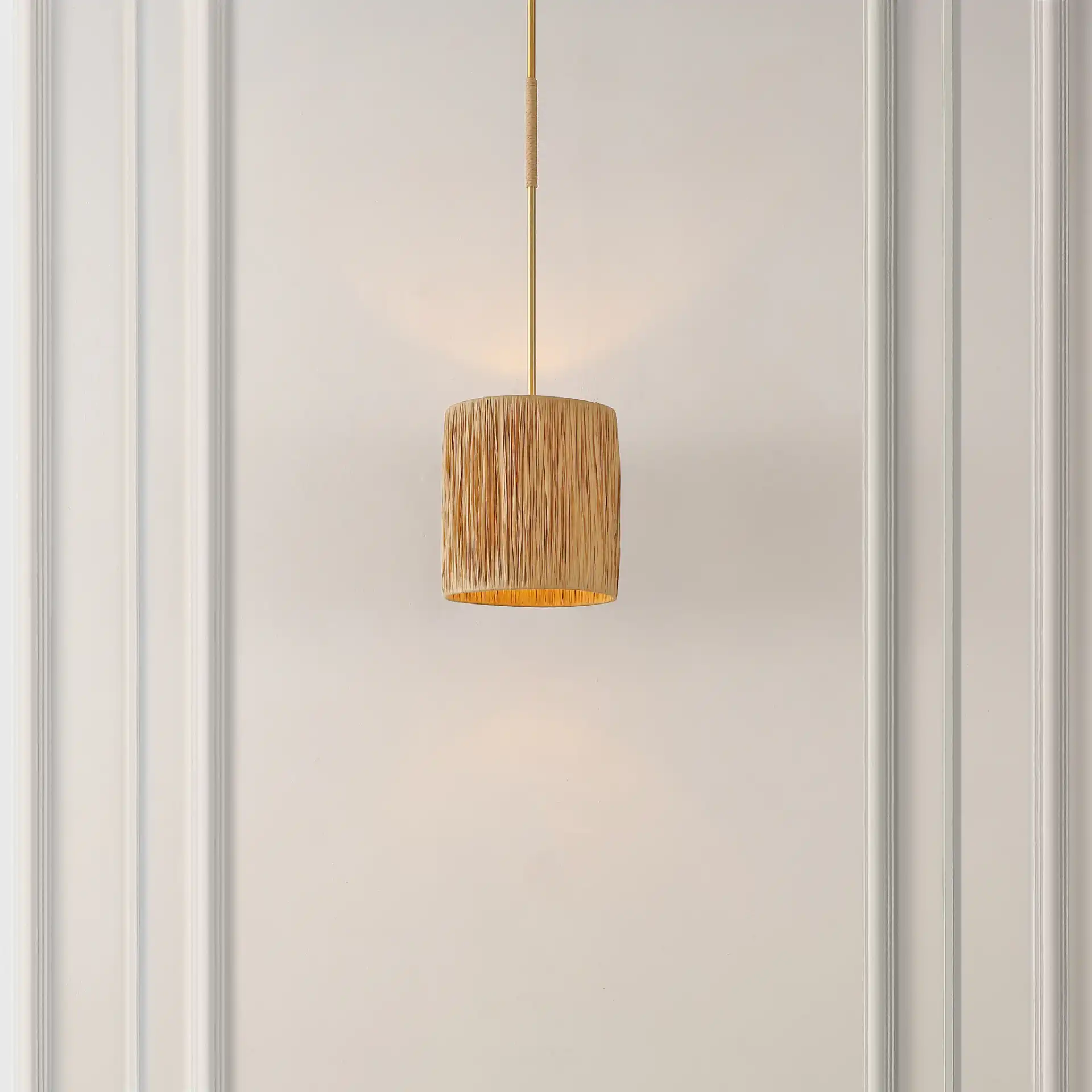 Saija Pendant in Natural / Gold in a styled room