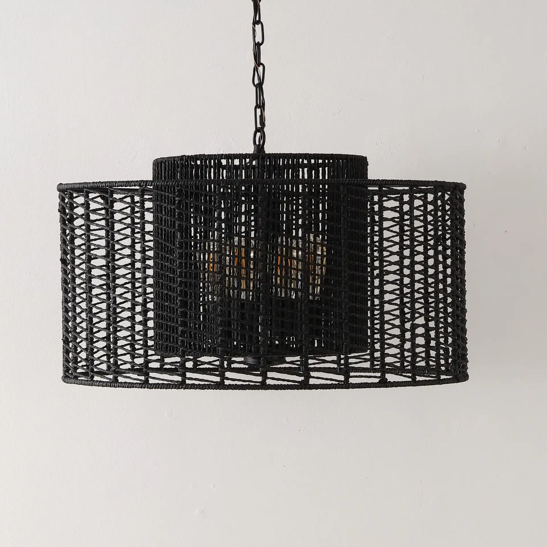 Brynora Four-Light Pendant in Black in a styled room