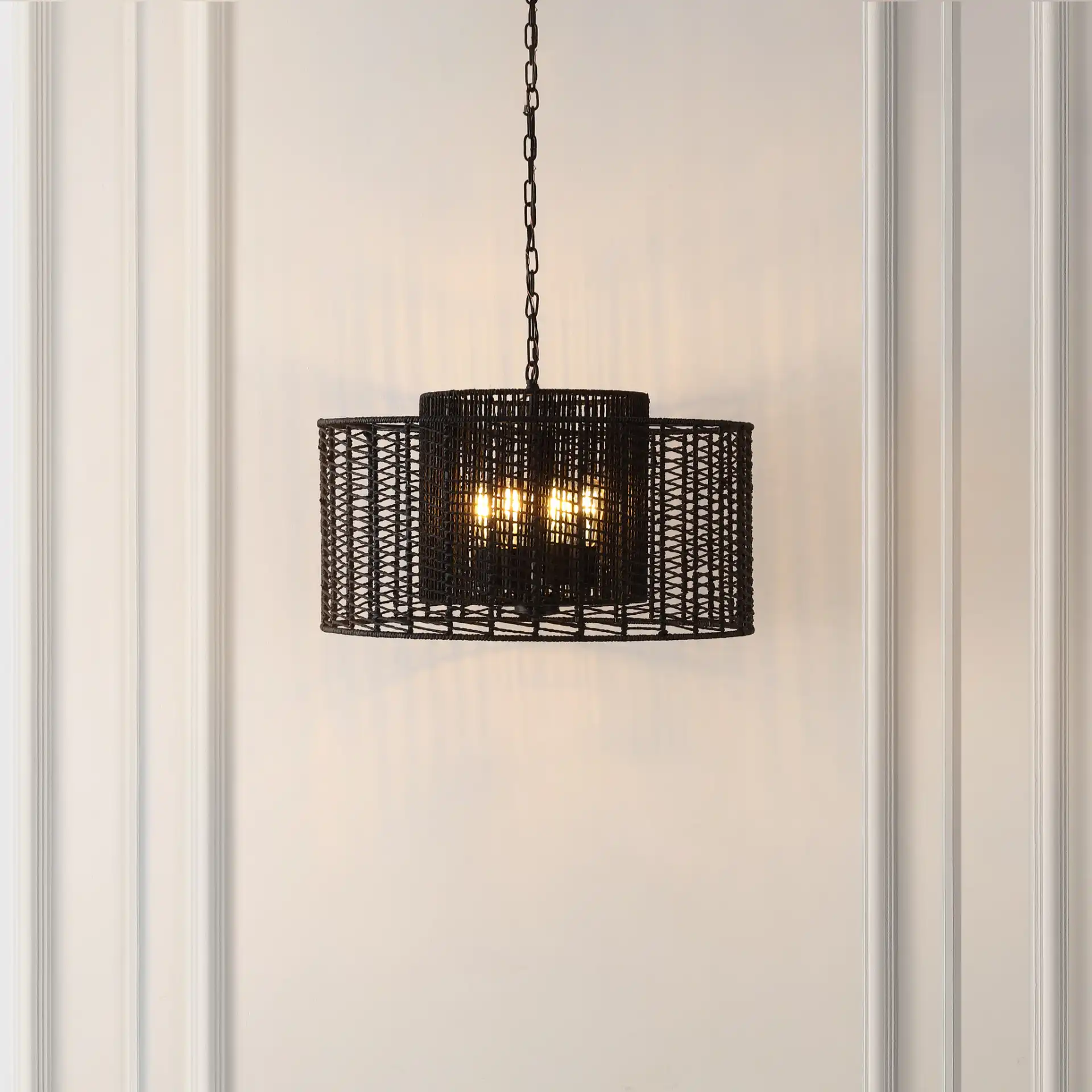 Brynora Four-Light Pendant in Black in a styled room