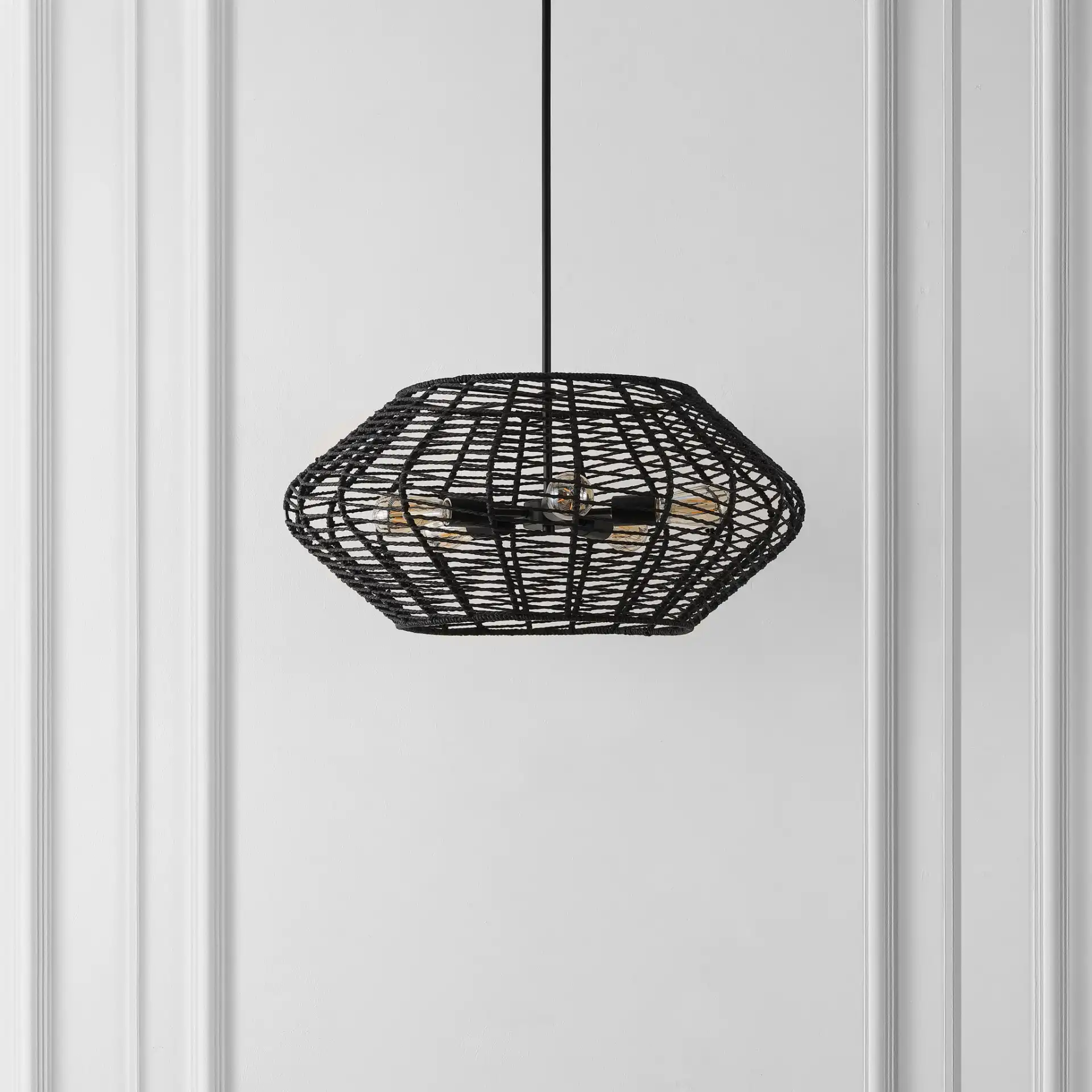 Briza Five-Light Pendant in Black in a styled room