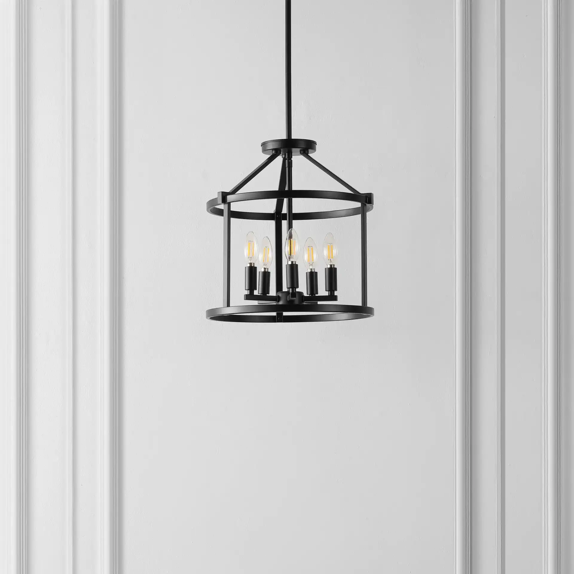 Navassa Five-Light Pendant in Black in a styled room
