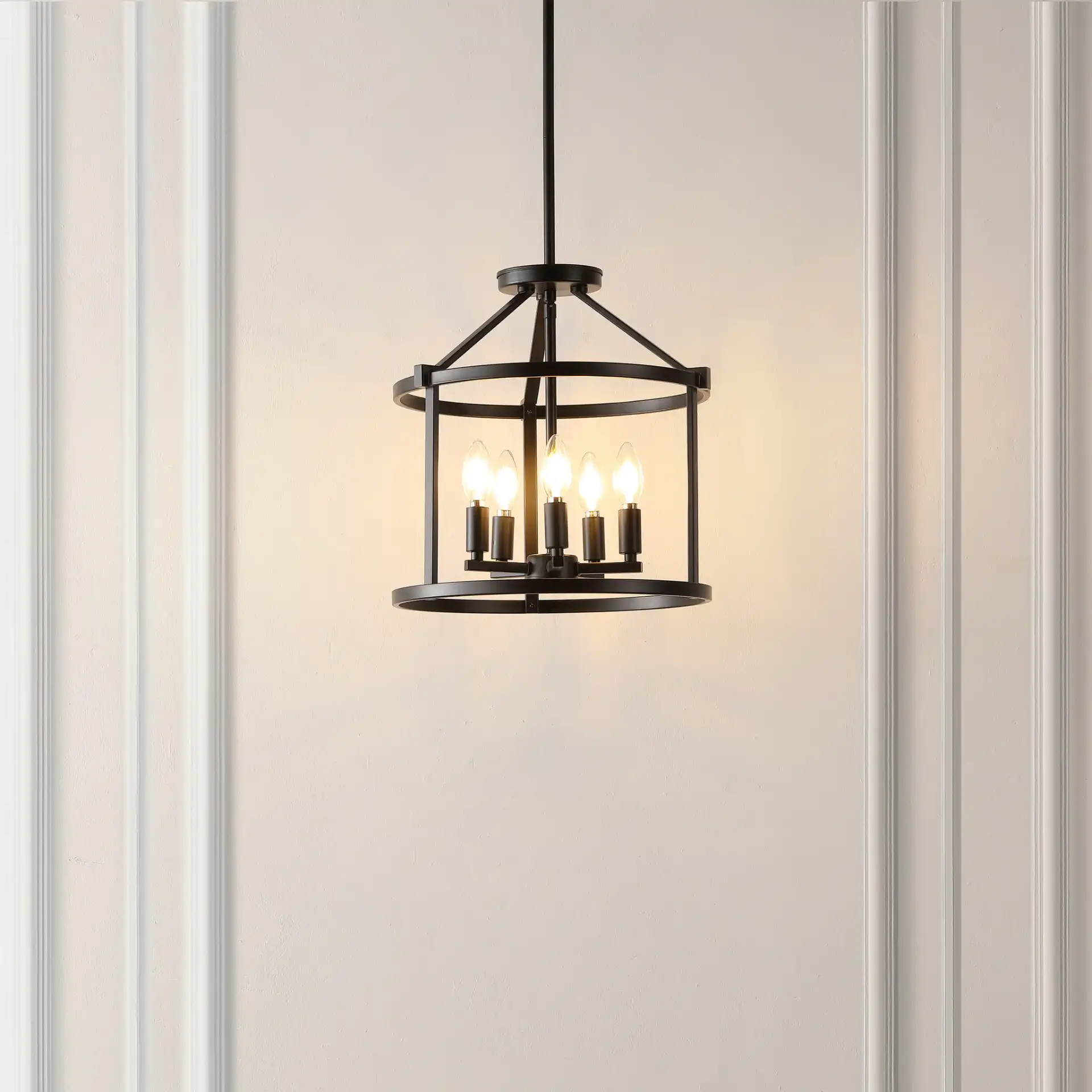 Navassa Five-Light Pendant in Black in a styled room