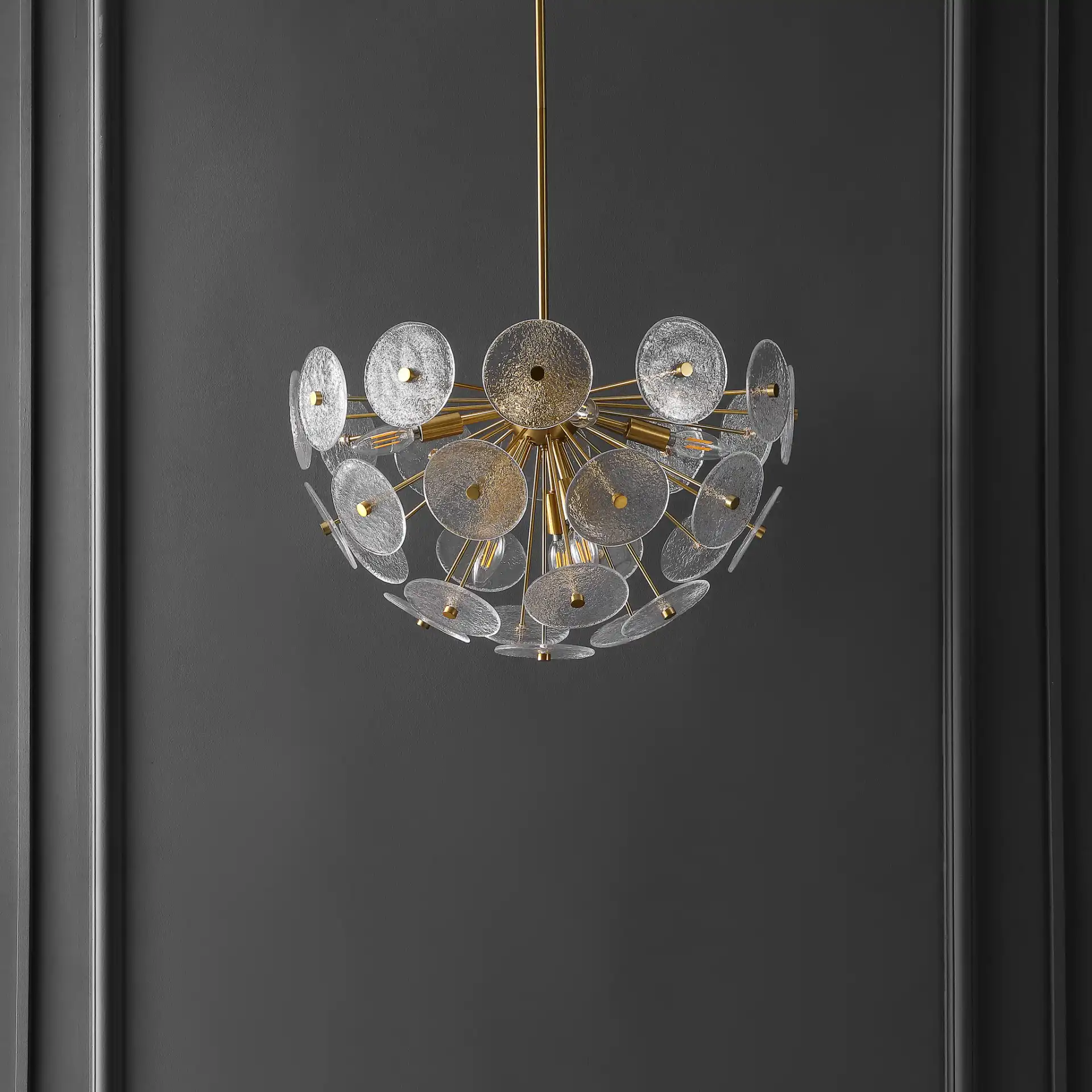 Miri Six-Light Pendant in Brass in a styled room
