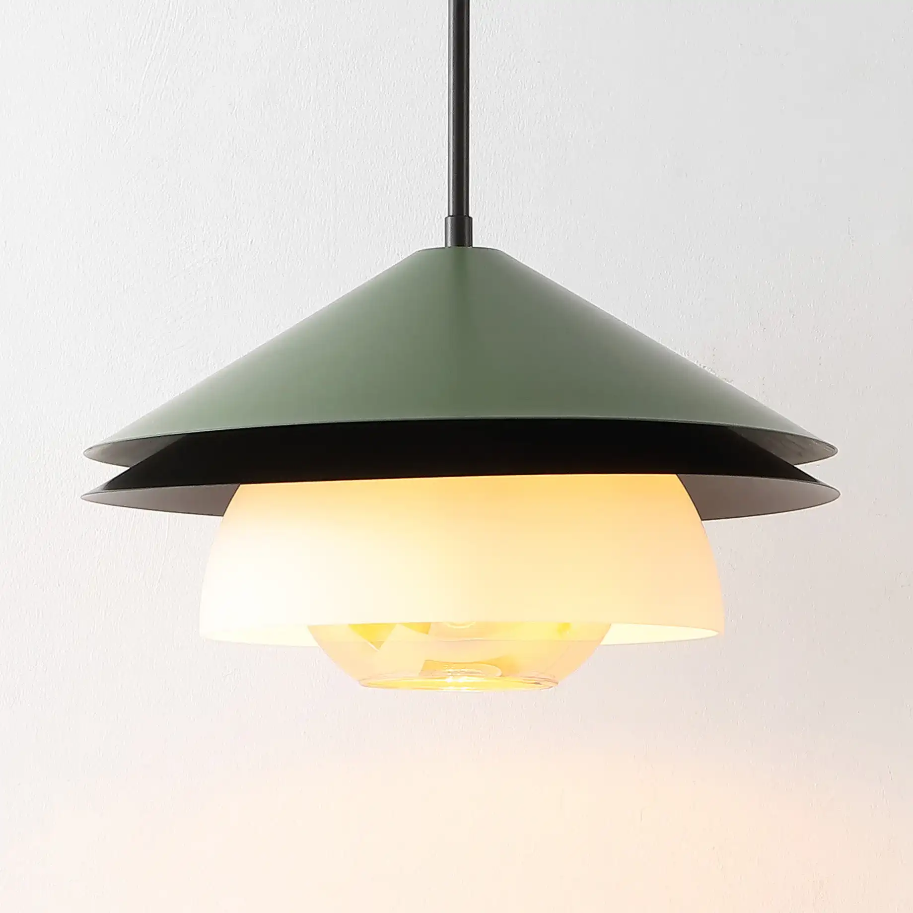 Jalen Pendant in Green in a styled room