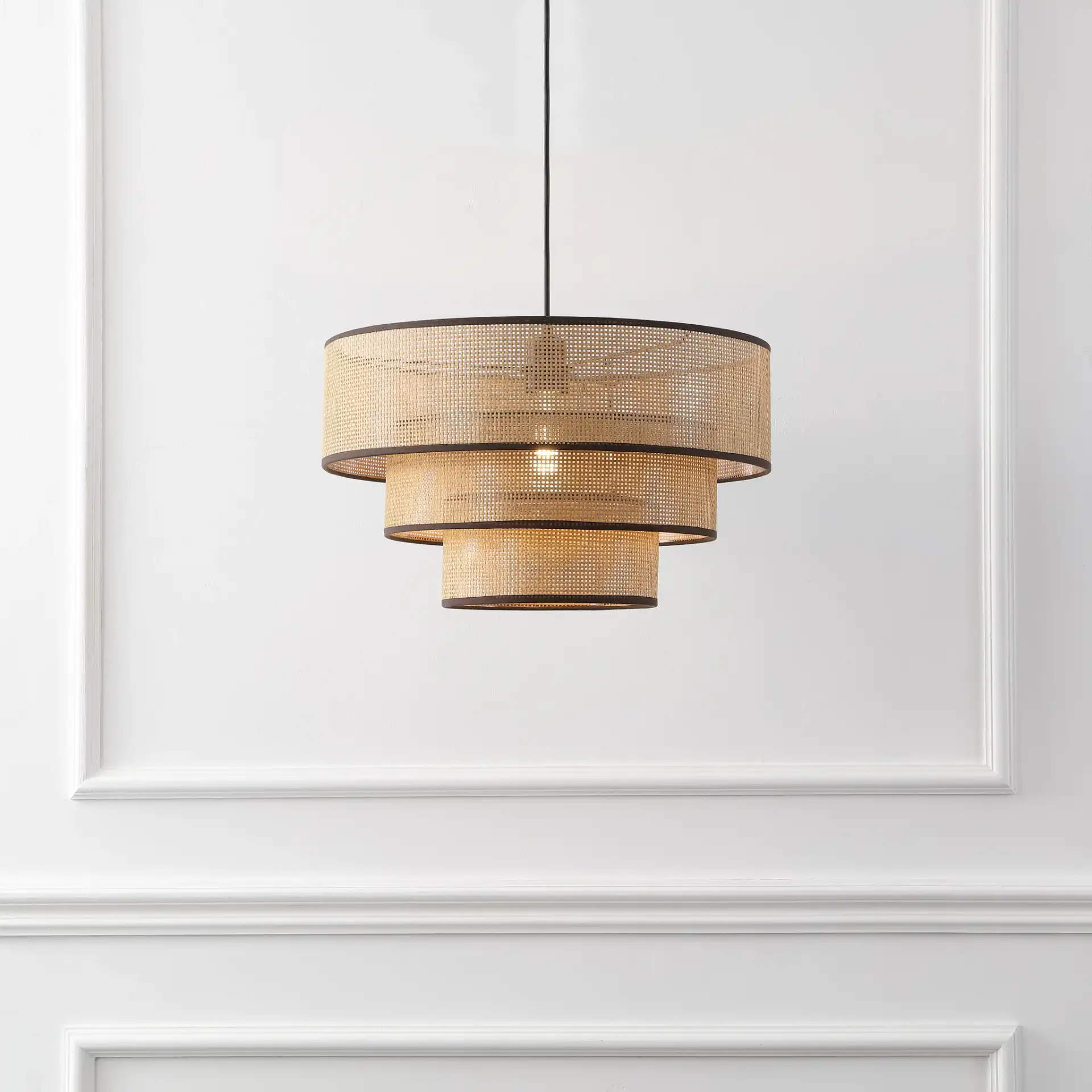 Malya Pendant in Brown / Natural in a styled room