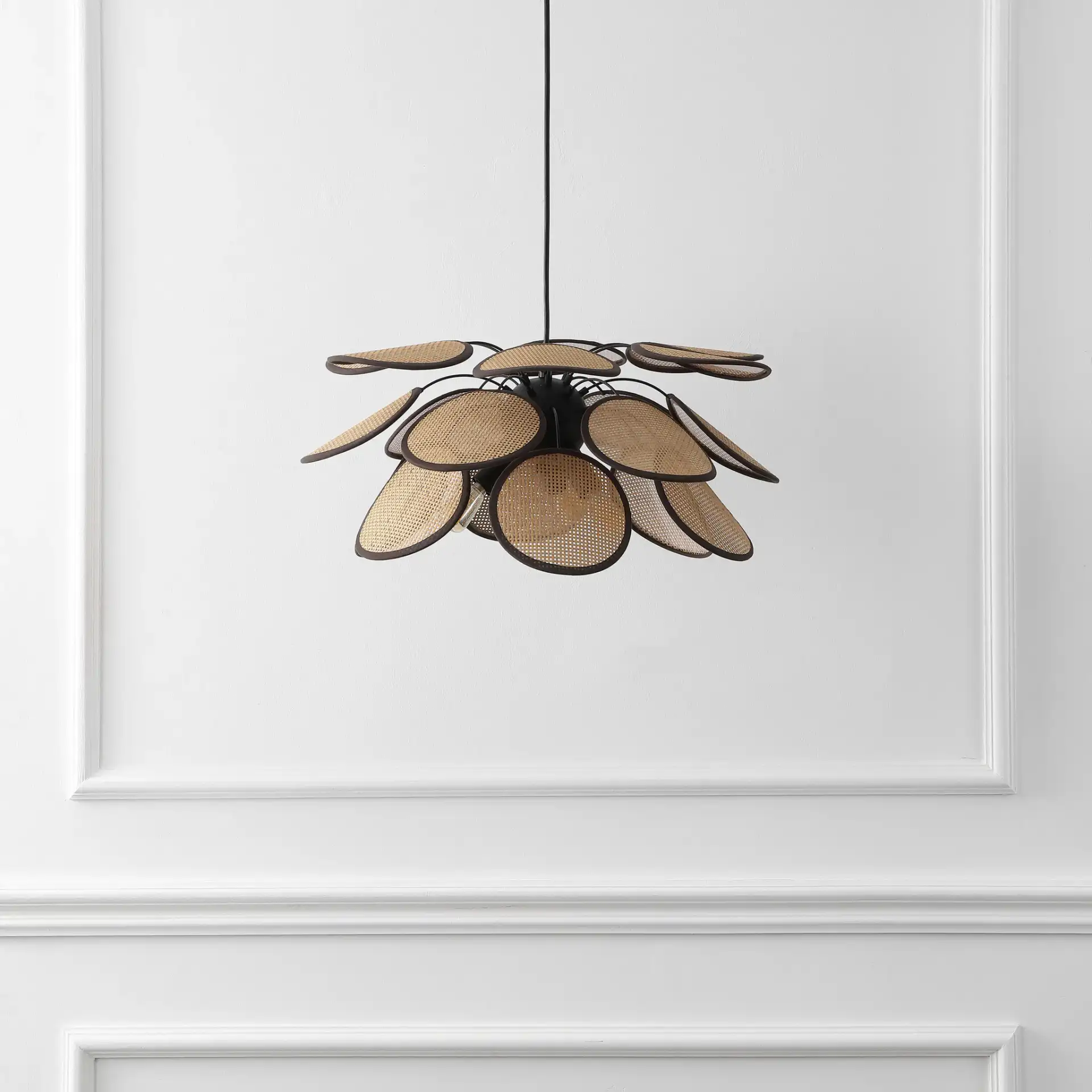 Luana Three-Light Pendant in Brown / Natural in a styled room