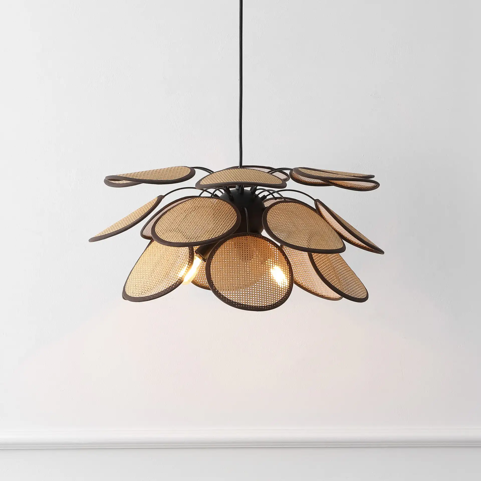 Luana Three-Light Pendant in Brown / Natural in a styled room
