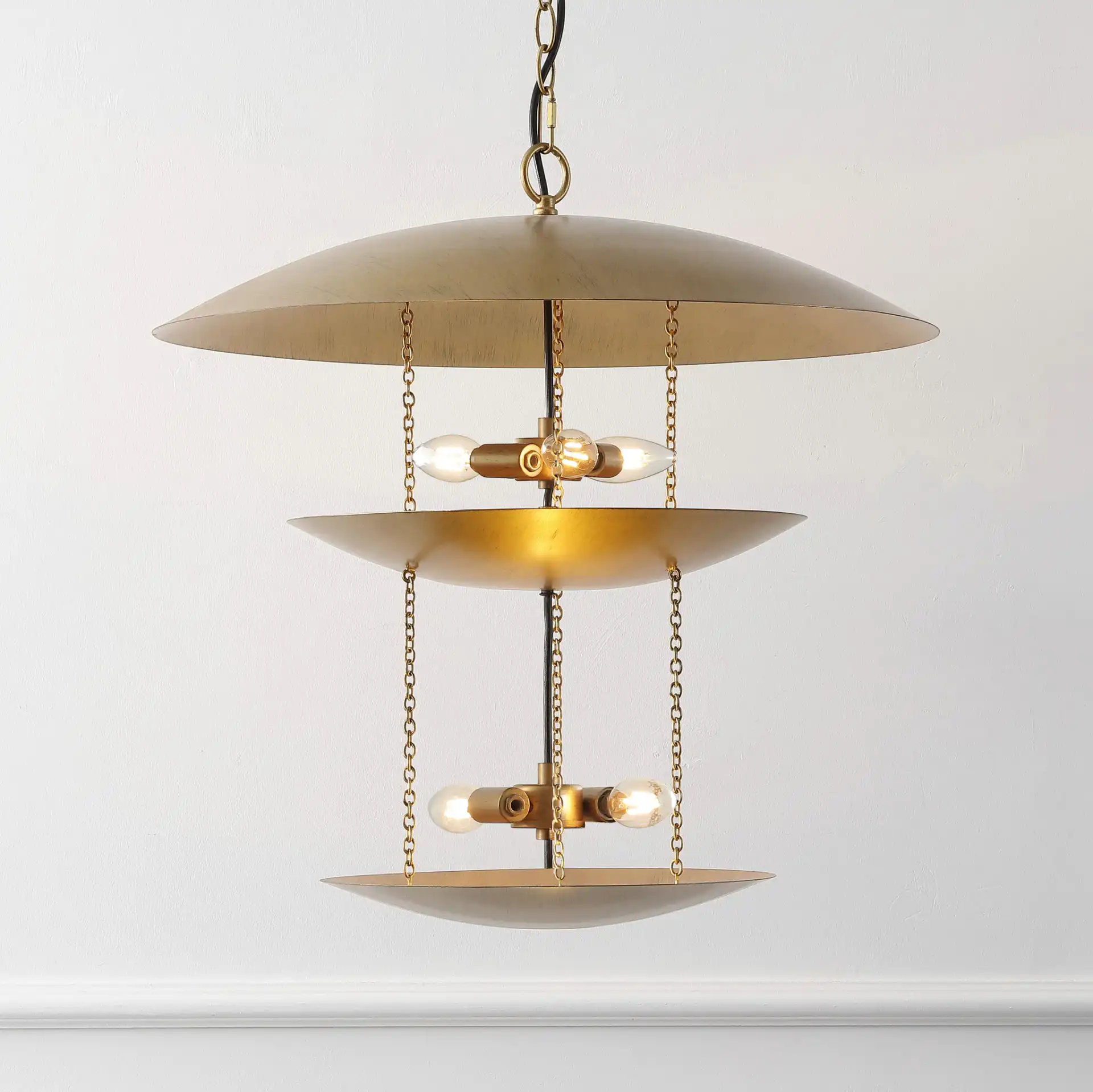 Jules Five-Light Pendant in Antique Gold in a styled room
