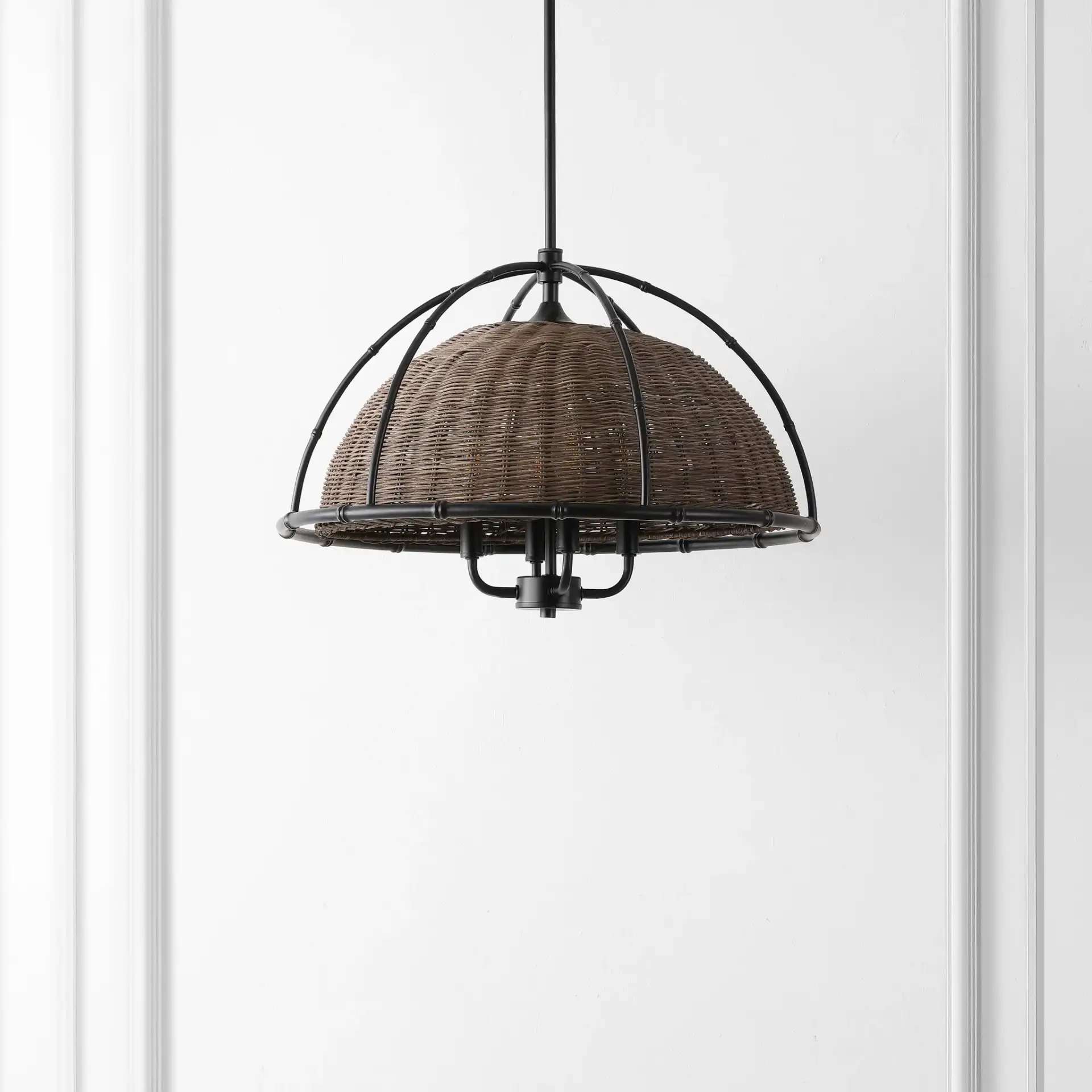 Paulina Four-Light Pendant in Dark Natural / Black in a styled room