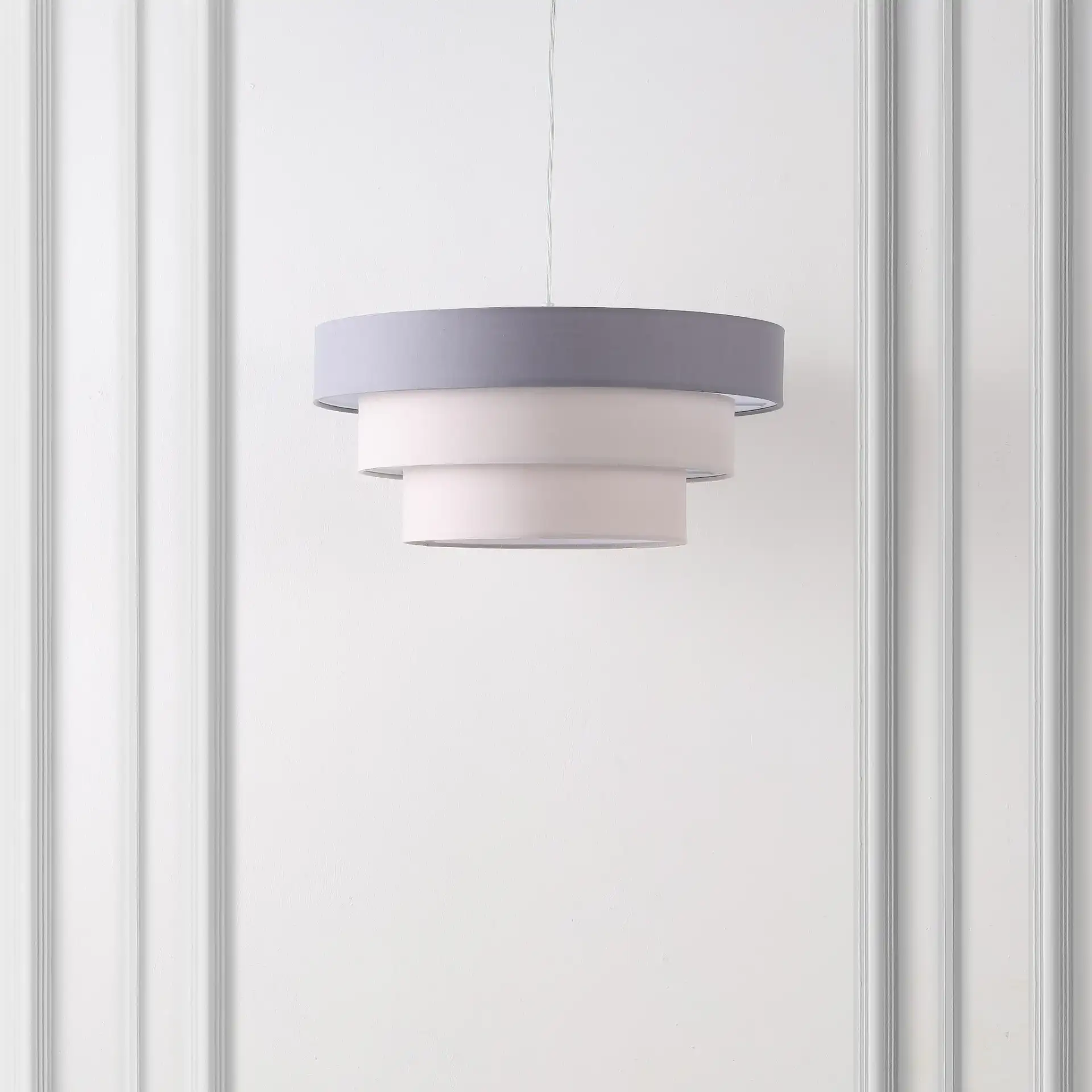 Clelia Pendant in Gray / White in a styled room