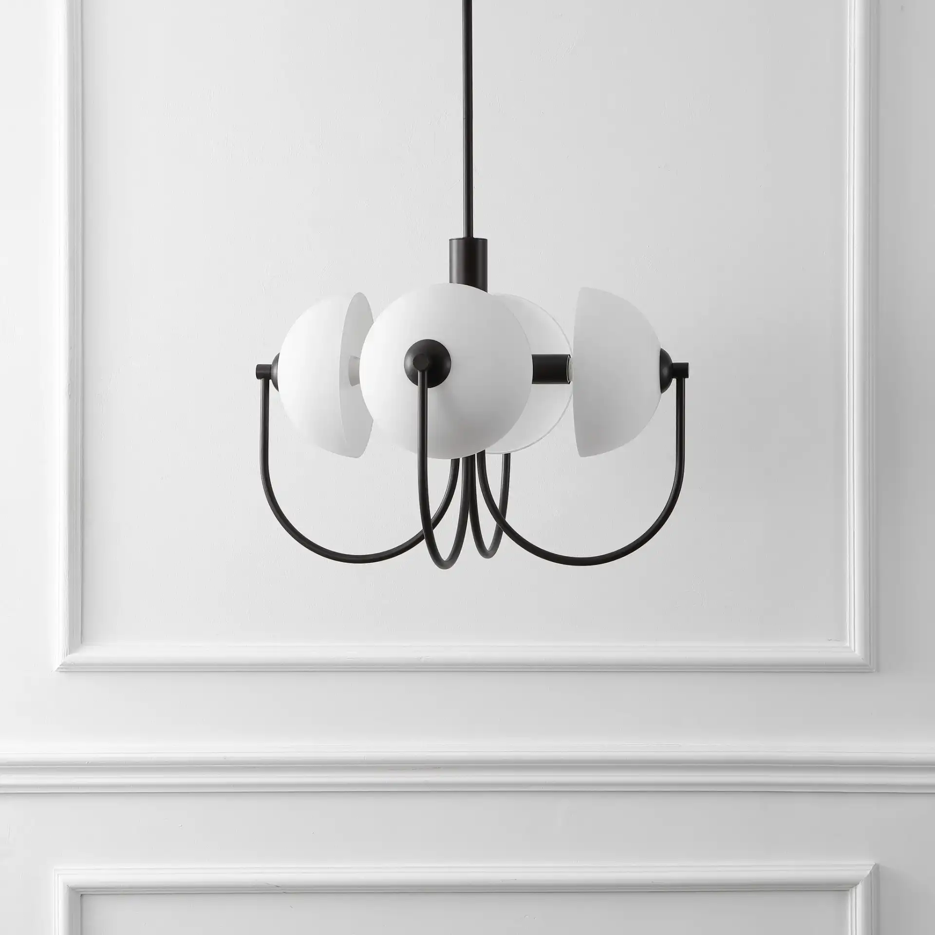 Dreya Four-Light Pendant in Oil Rub Bronze in a styled room