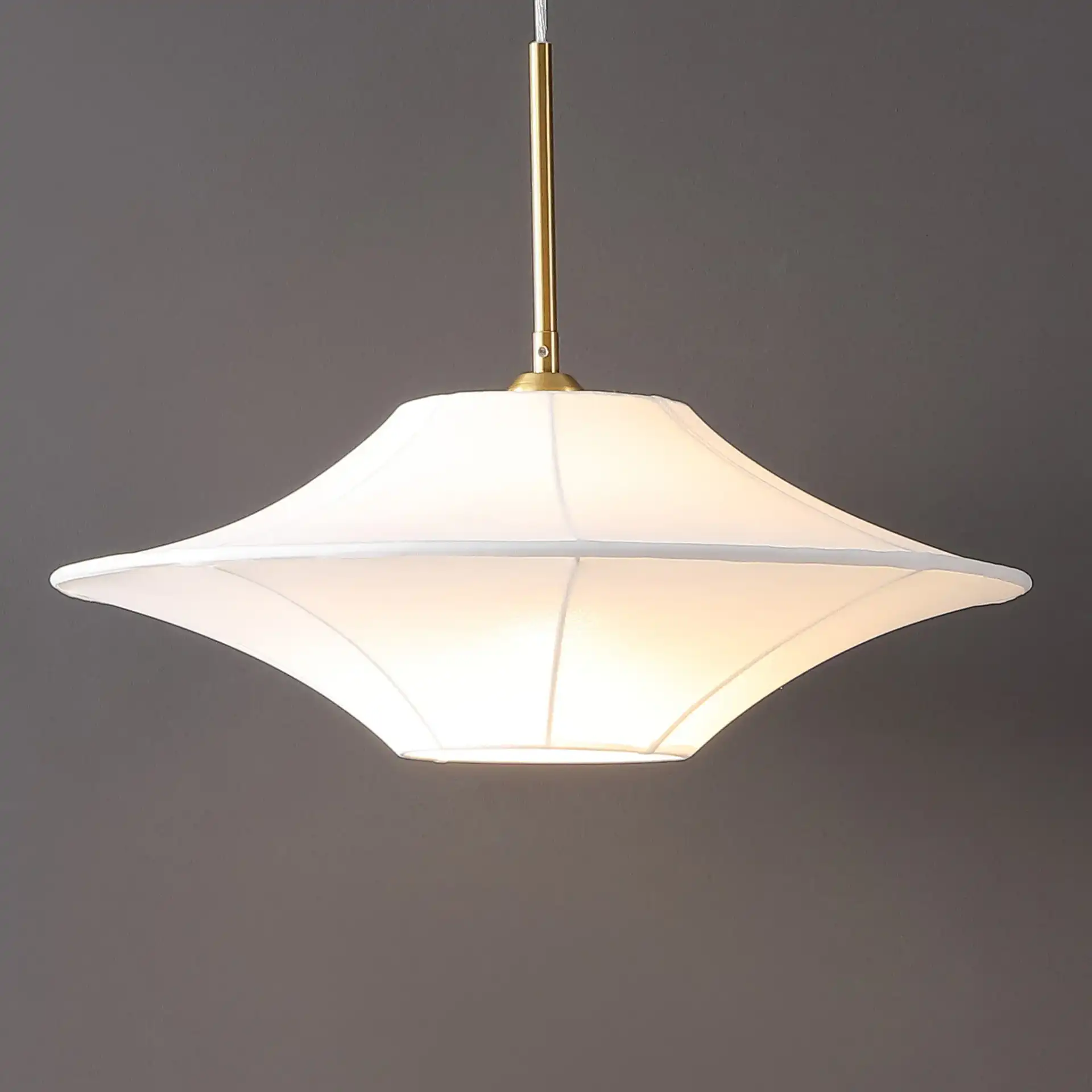 Lanai Pendant in White / Brass in a styled room