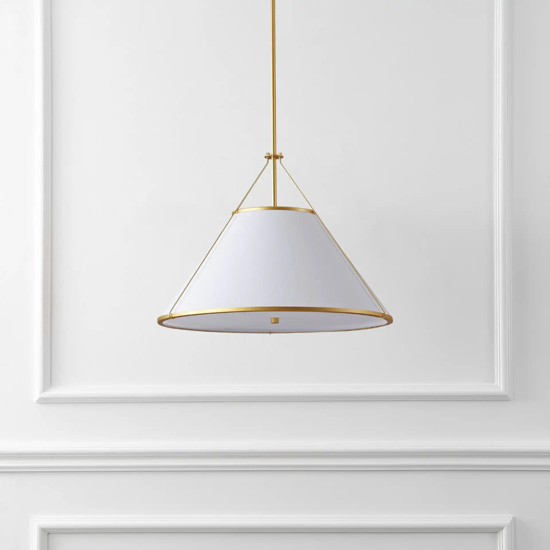 Lainey Three-Light Pendant in White / Gold in a styled room
