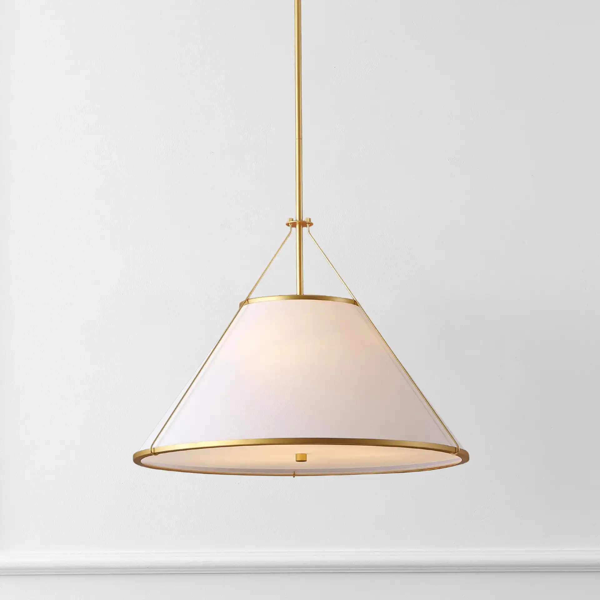 Lainey Three-Light Pendant in White / Gold in a styled room