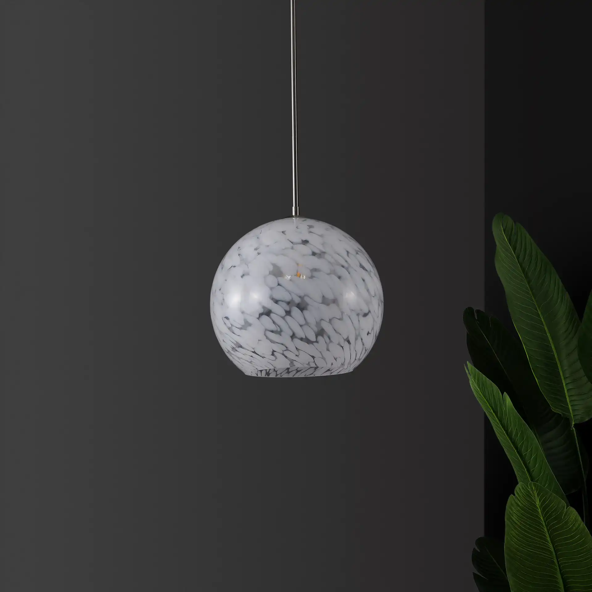 Ines Pendant in Nickel in a styled room