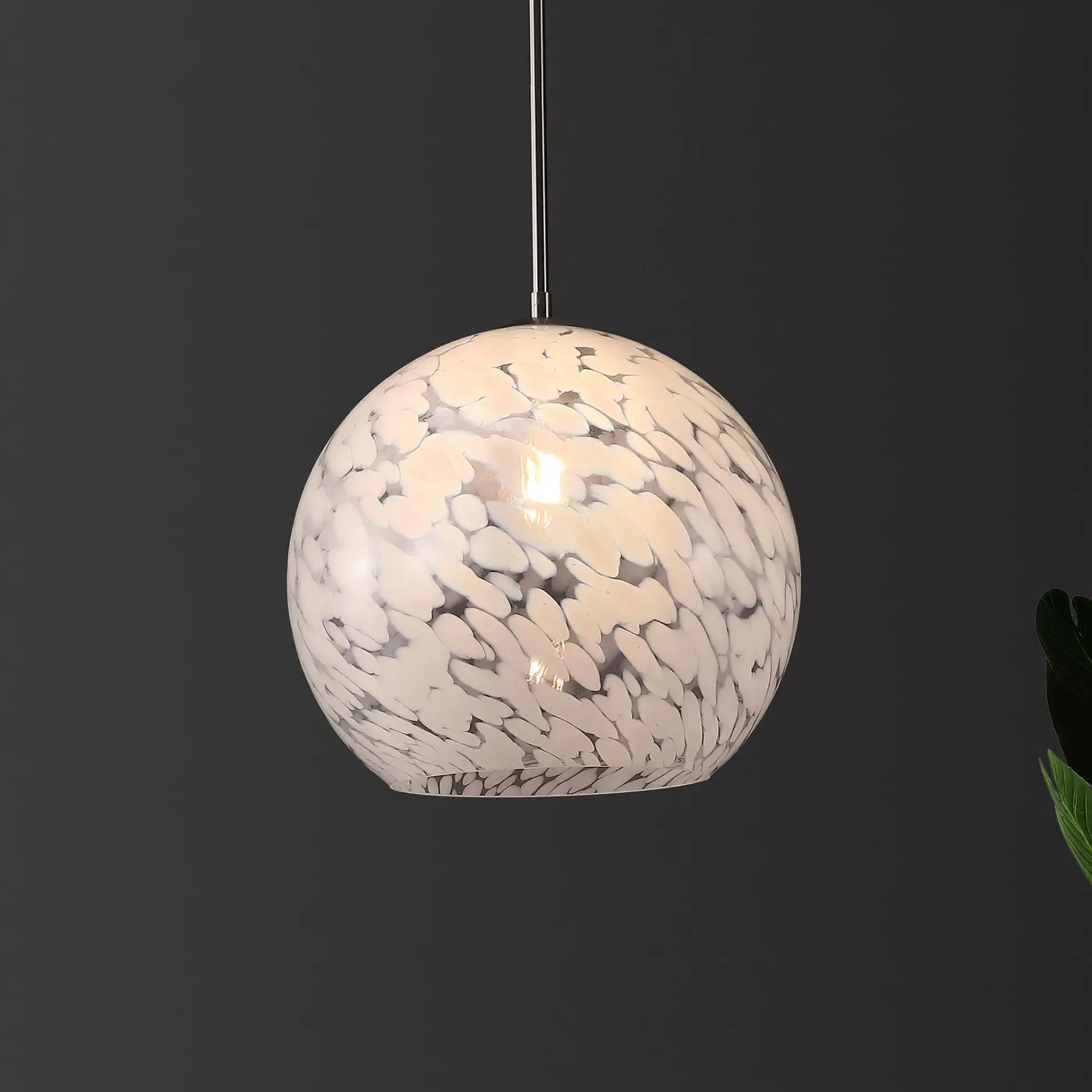 Ines Pendant in Nickel in a styled room