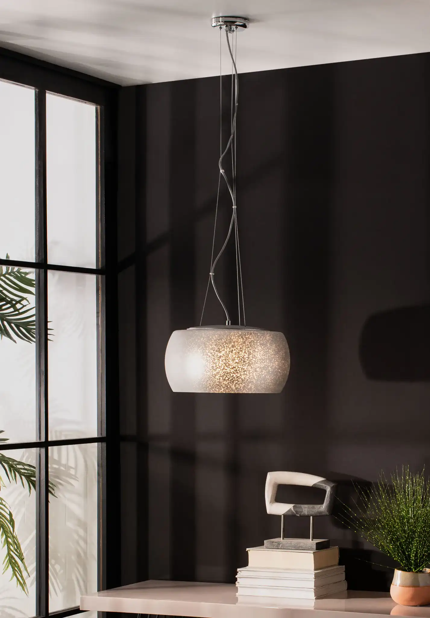 Bakari Five-Light Pendant in Chrome in a styled room