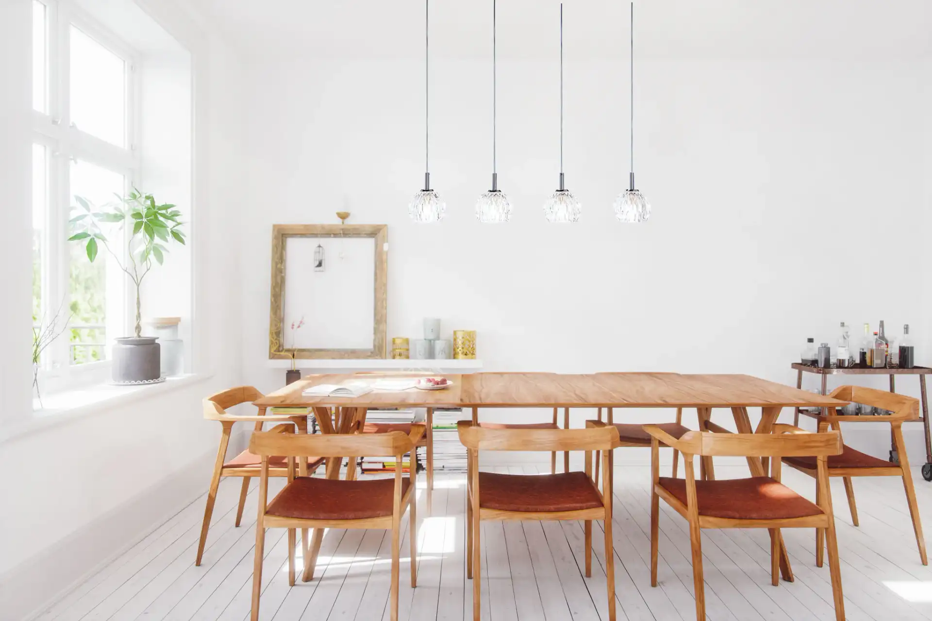 Lanson Four-Light Pendant in Antique White in a styled room
